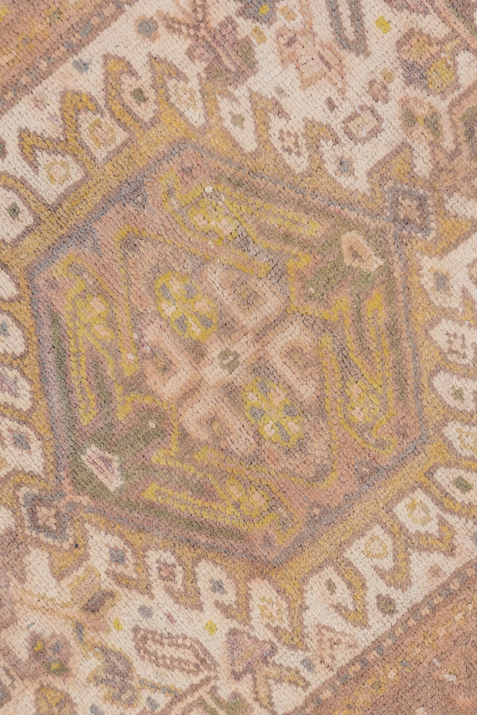 2' x 10' one-of-a-kind handmade vintage Karaje runner rug. Color palette: brown, gray, light gray, off-white, pink, snow