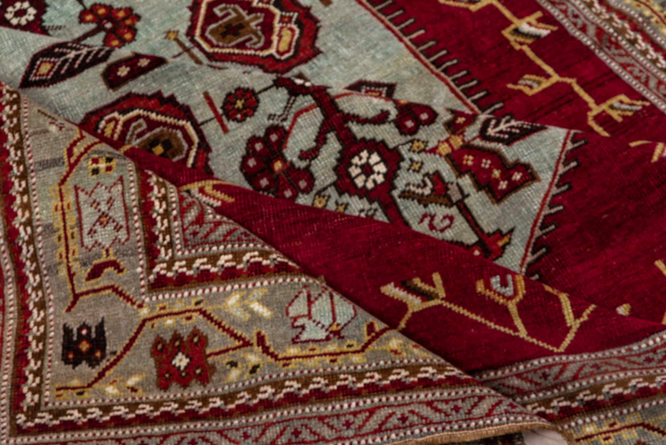 5' x 7' one-of-a-kind handmade antique Oushak rug. Color palette: red, ivory, burgundy, camel, gold, brown, beige