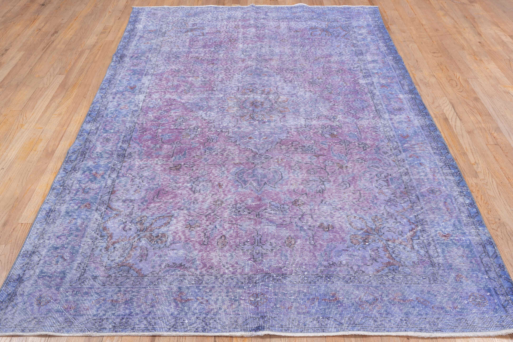 5' x 9' one-of-a-kind handmade vintage Overdyed medium size rug. Color palette: lavender, lilac, periwinkle, ivory, rose