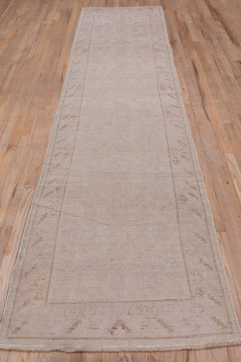 2' x 12' one-of-a-kind handmade vintage Khotan runner rug. Color palette: taupe, beige, camel, rose, ivory, gray, pink, red
