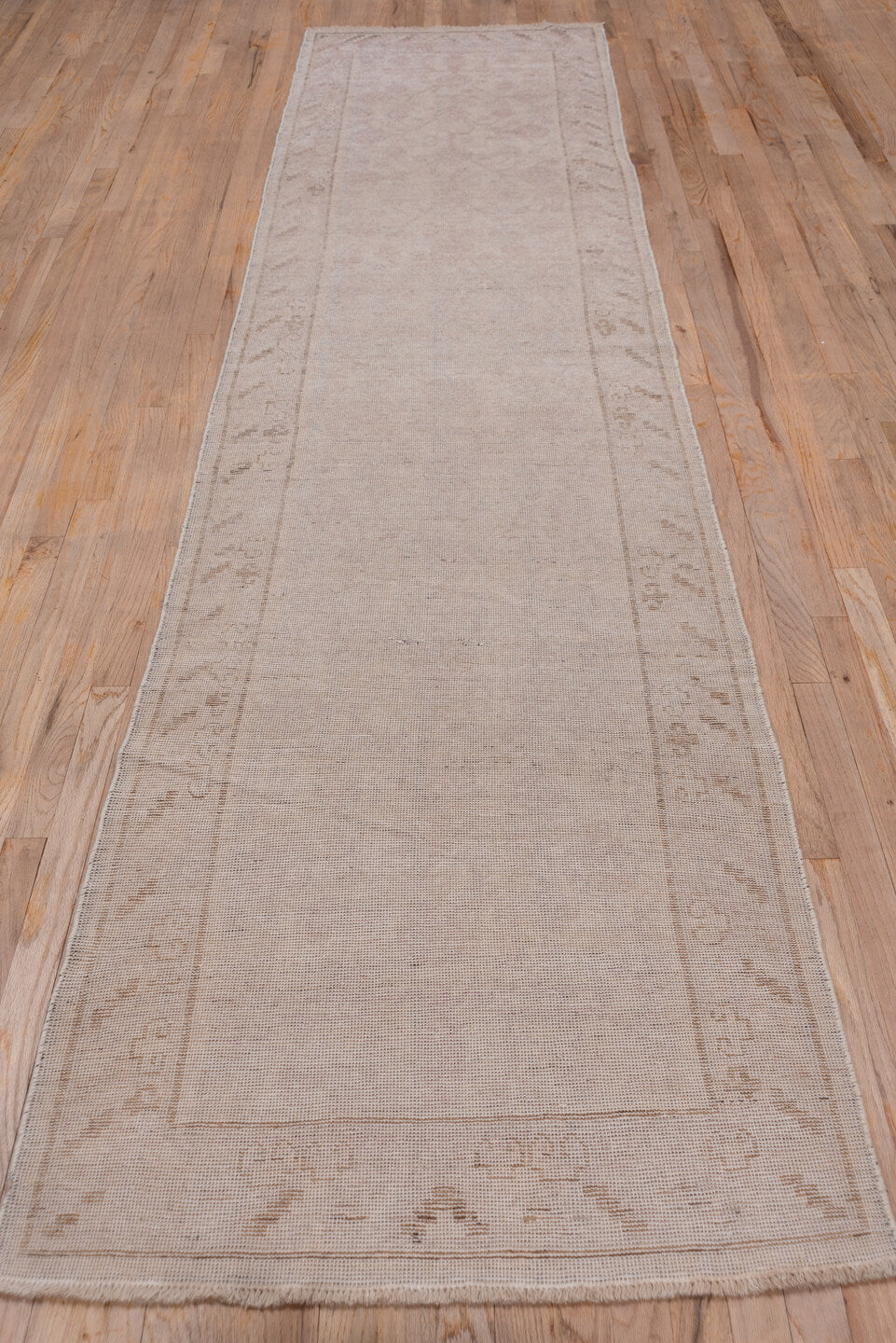 2' x 12' one-of-a-kind handmade vintage Khotan runner rug. Color palette: taupe, beige, camel, rose, ivory, gray, pink, red