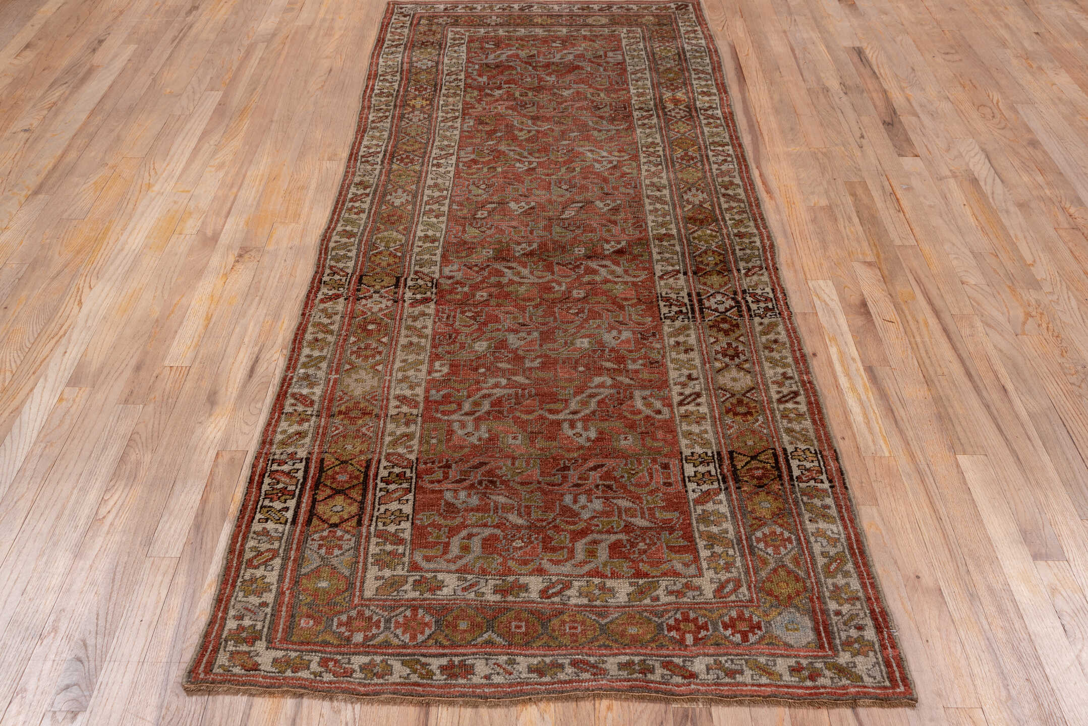 3' x 9' one-of-a-kind handmade antique Bidjar runner rug. Color palette: rust, ivory, taupe, sage, terra cotta, gold, brown