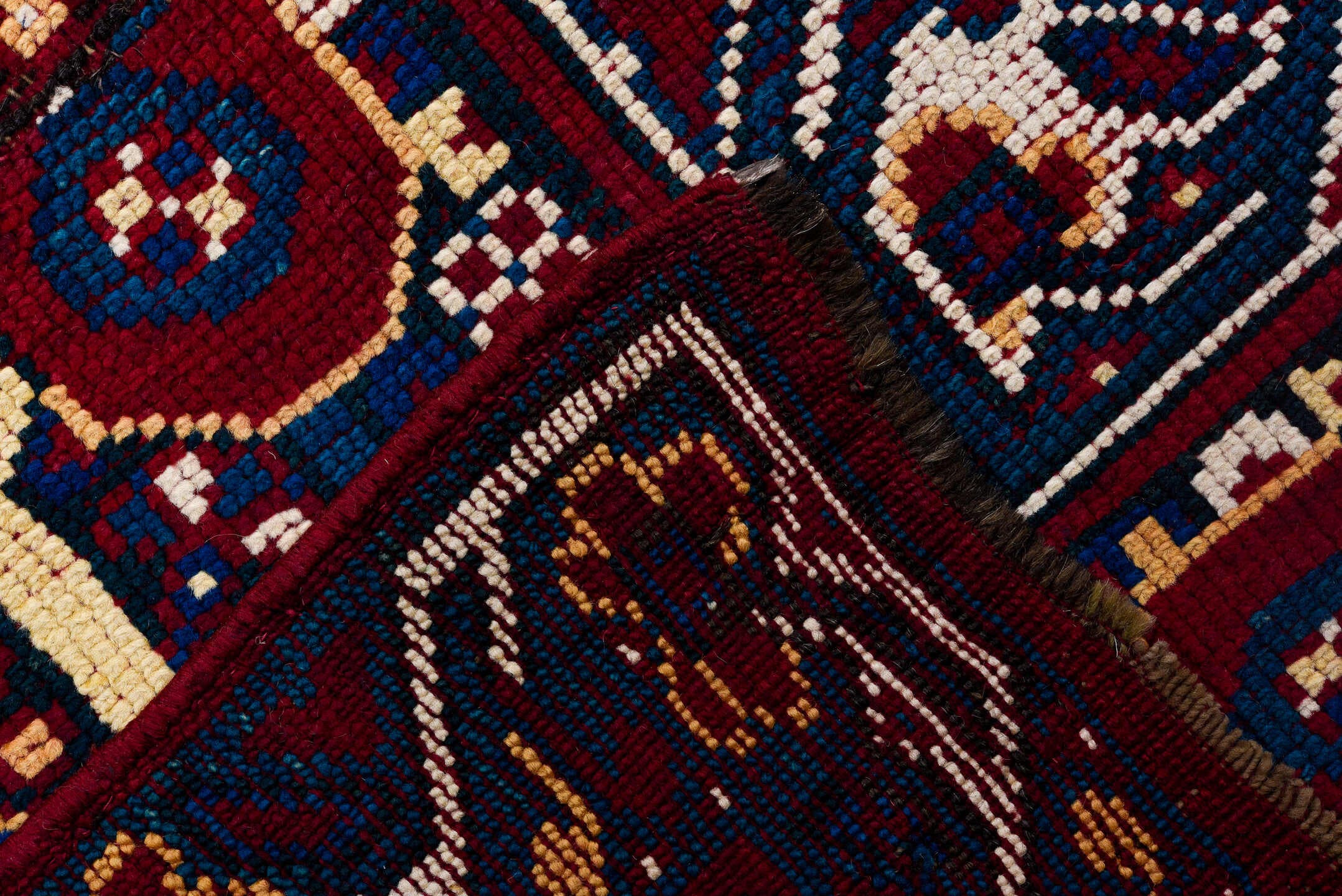 6' x 18' one-of-a-kind handmade antique Moroccan rug. Color palette: crimson, indigo, ivory, navy, rust, saffron, camel, red
