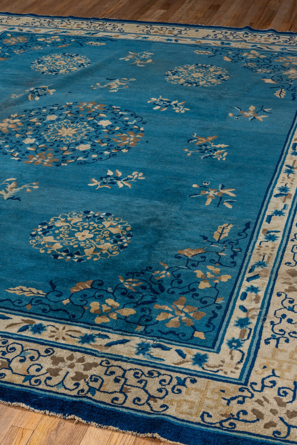 8' x 9' one-of-a-kind handmade vintage Chinese rug. Color palette: blue, ivory, navy, beige, teal, camel