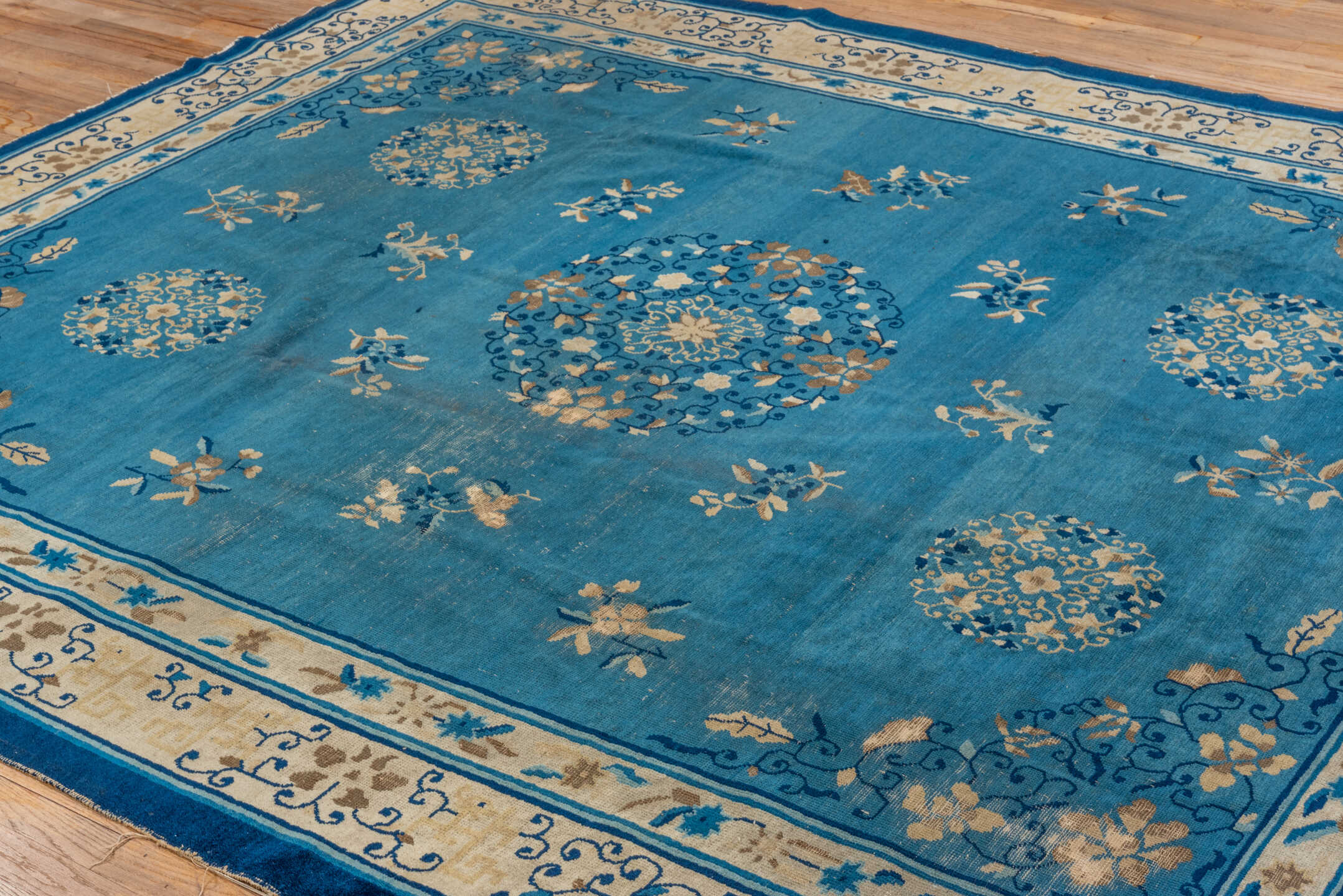 8' x 9' one-of-a-kind handmade vintage Chinese rug. Color palette: blue, ivory, navy, beige, teal, camel