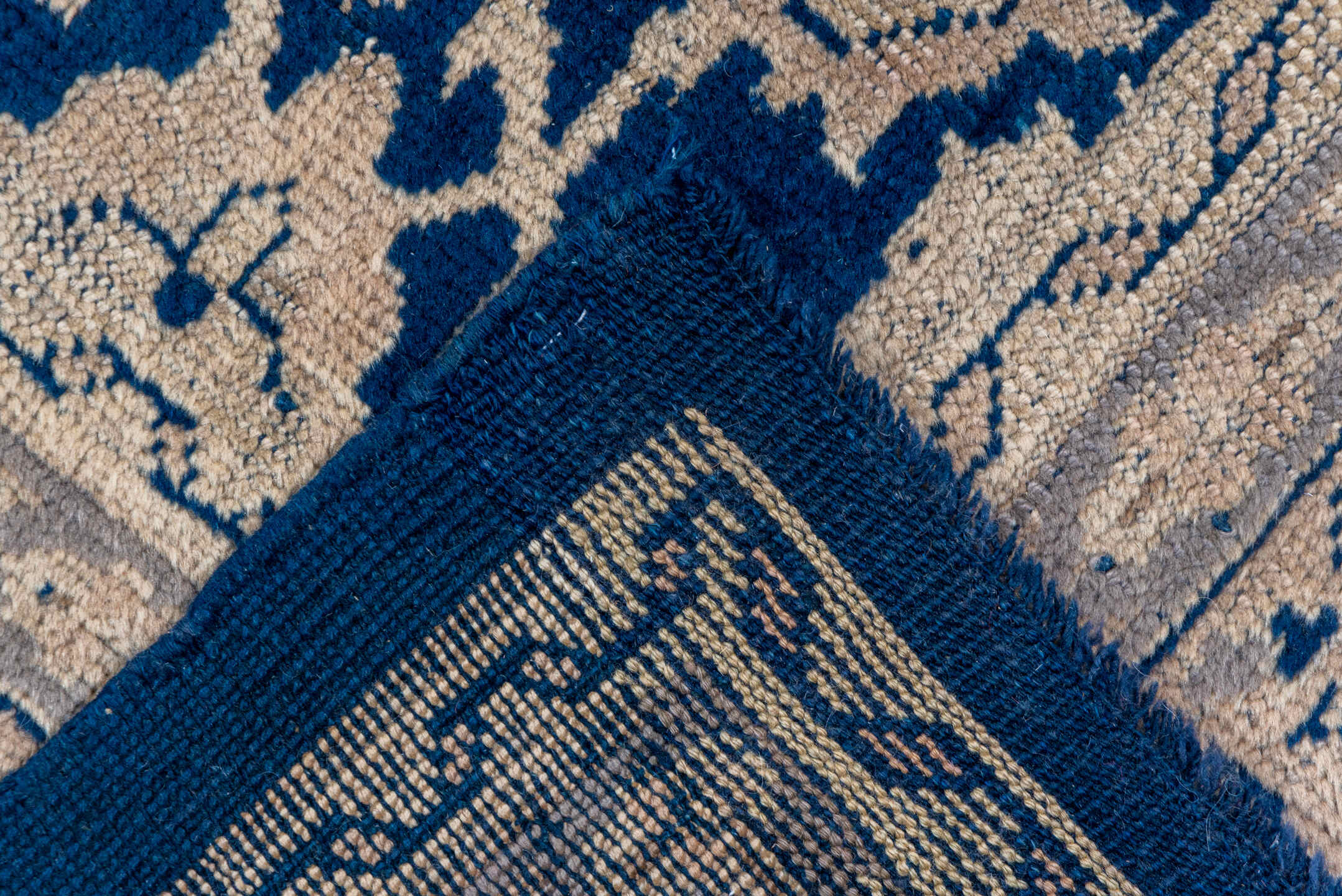 9' x 17' one-of-a-kind handmade antique Oushak rug. Color palette: navy, ivory, beige, taupe, blue, gray