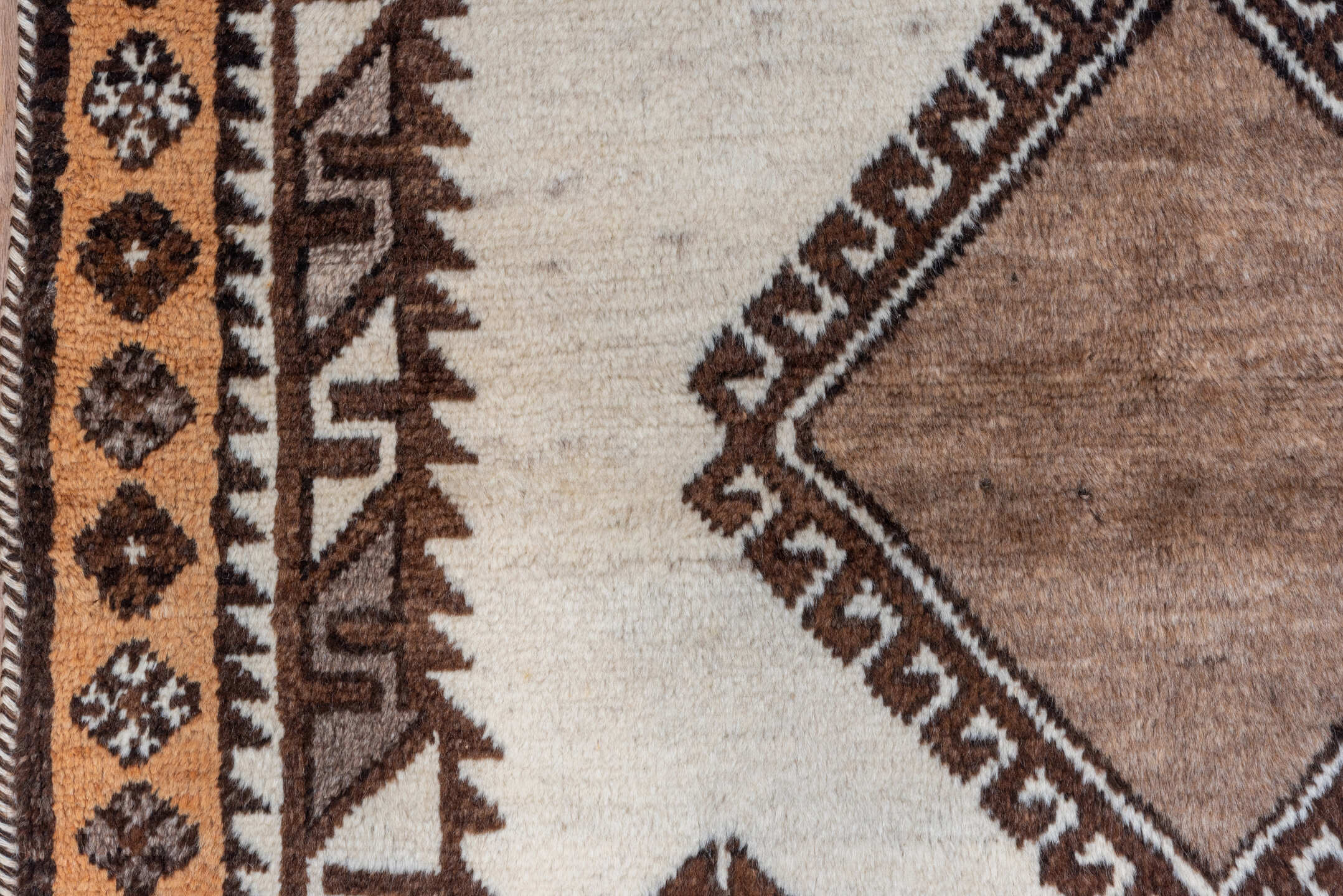 3' x 6' one-of-a-kind handmade vintage Gabbe runner rug. Color palette: brown, dark gray, gray, light gray, off-white, pink