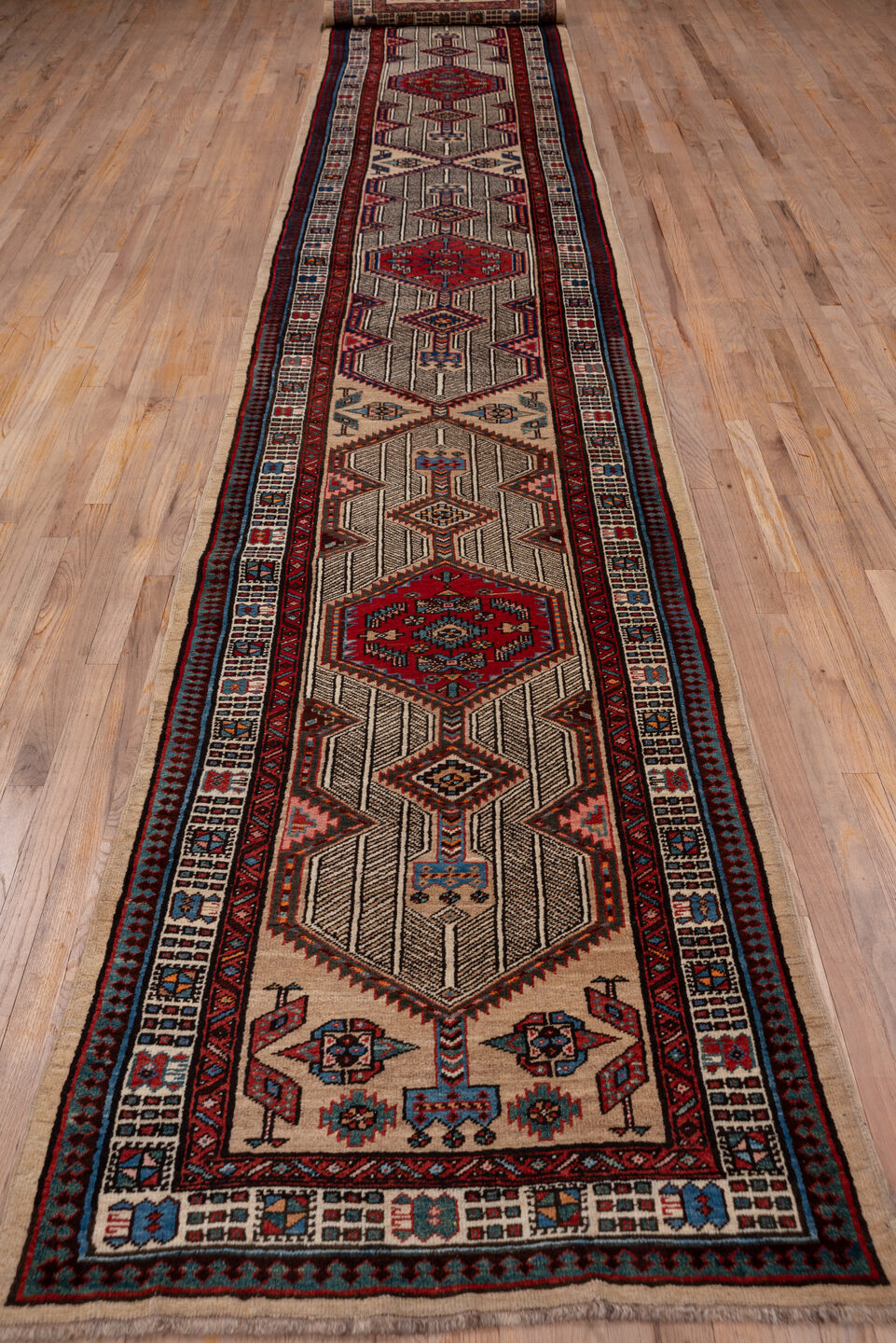 3' x 17' one-of-a-kind handmade vintage Sarab runner rug. Color palette: blue, brown, gray, light gray, pink, red, redwood