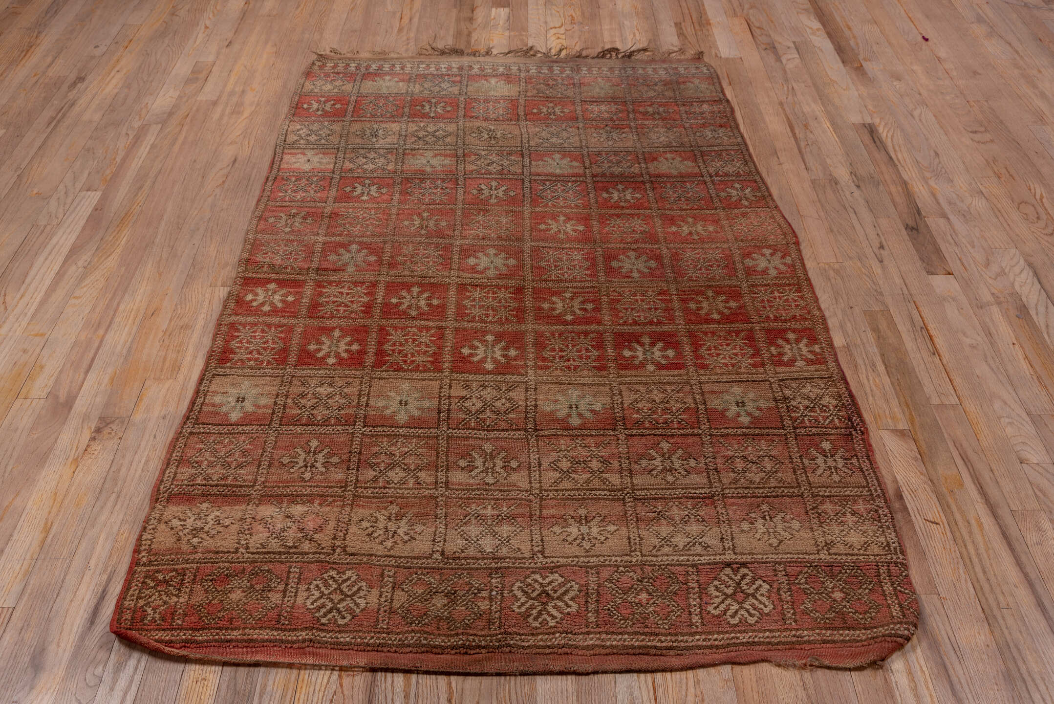 4' x 7' one-of-a-kind handmade vintage Moroccan rug. Color palette: brown, gray, off-white, pink, red, redwood, snow, white