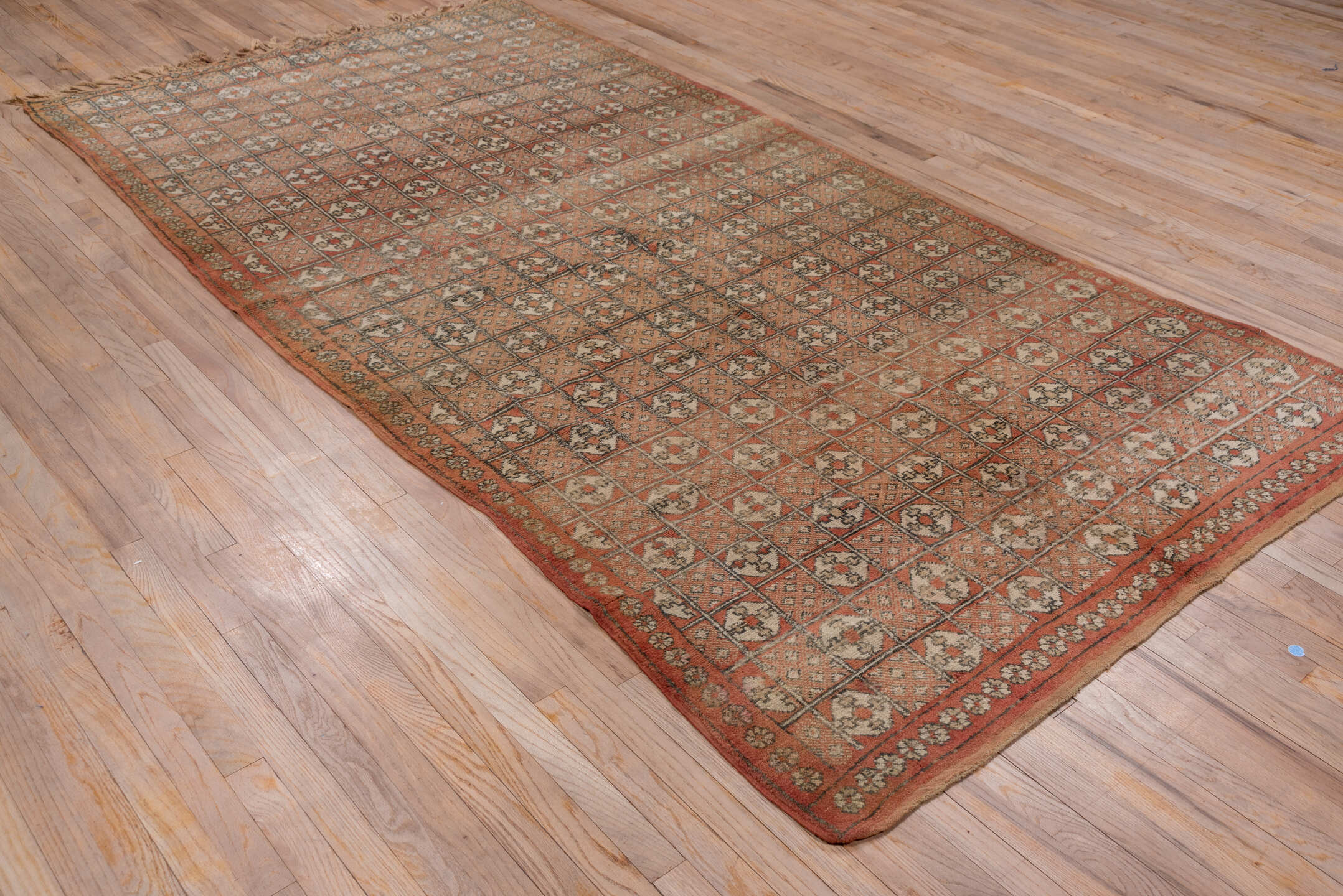 5' x 10' one-of-a-kind handmade vintage Moroccan medium size rug. Color palette: brown, gray, pink