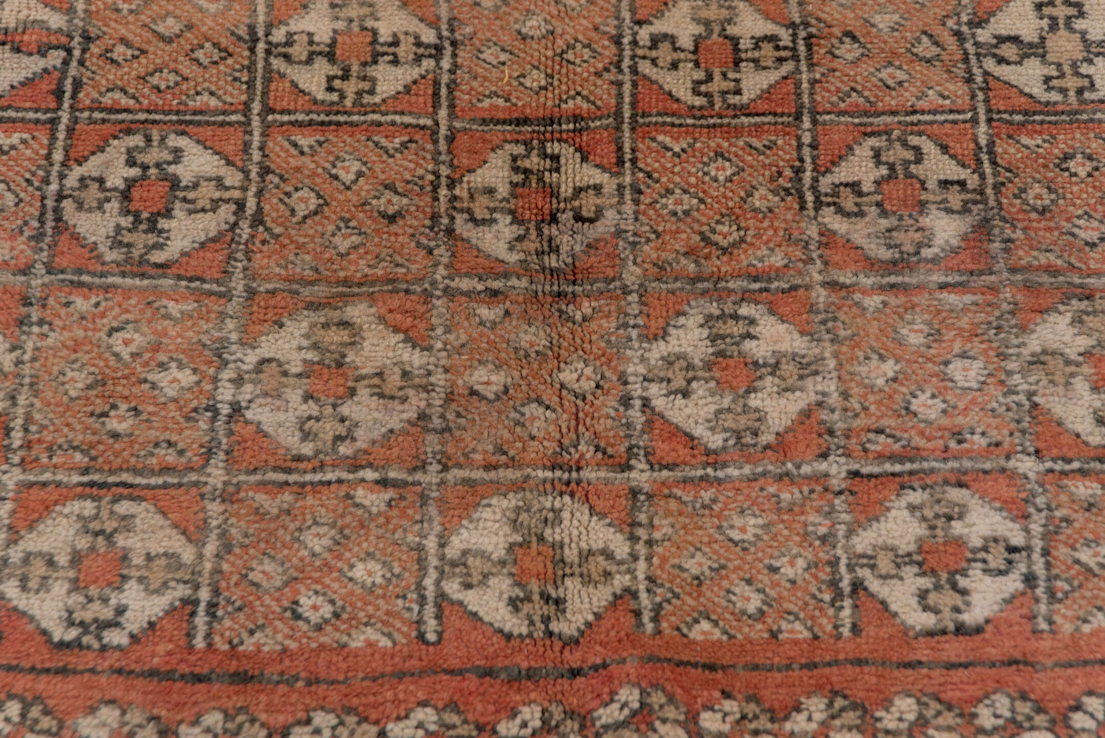 5' x 10' one-of-a-kind handmade vintage Moroccan medium size rug. Color palette: terra cotta, ivory, charcoal, camel, taupe