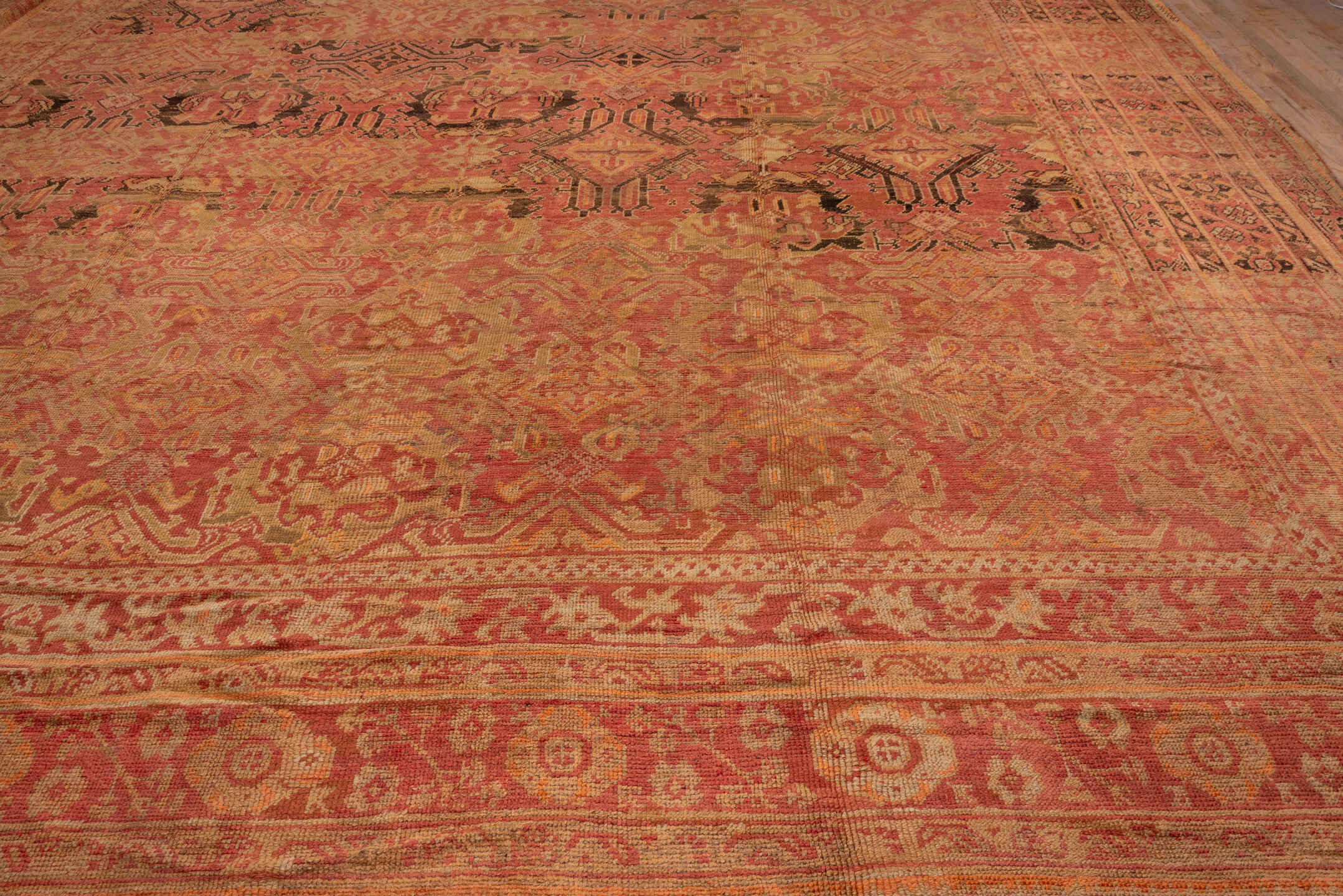 16' x 28' one-of-a-kind handmade antique Oushak oversize rug. Color palette: terra cotta, salmon, gold, rust, camel, brown