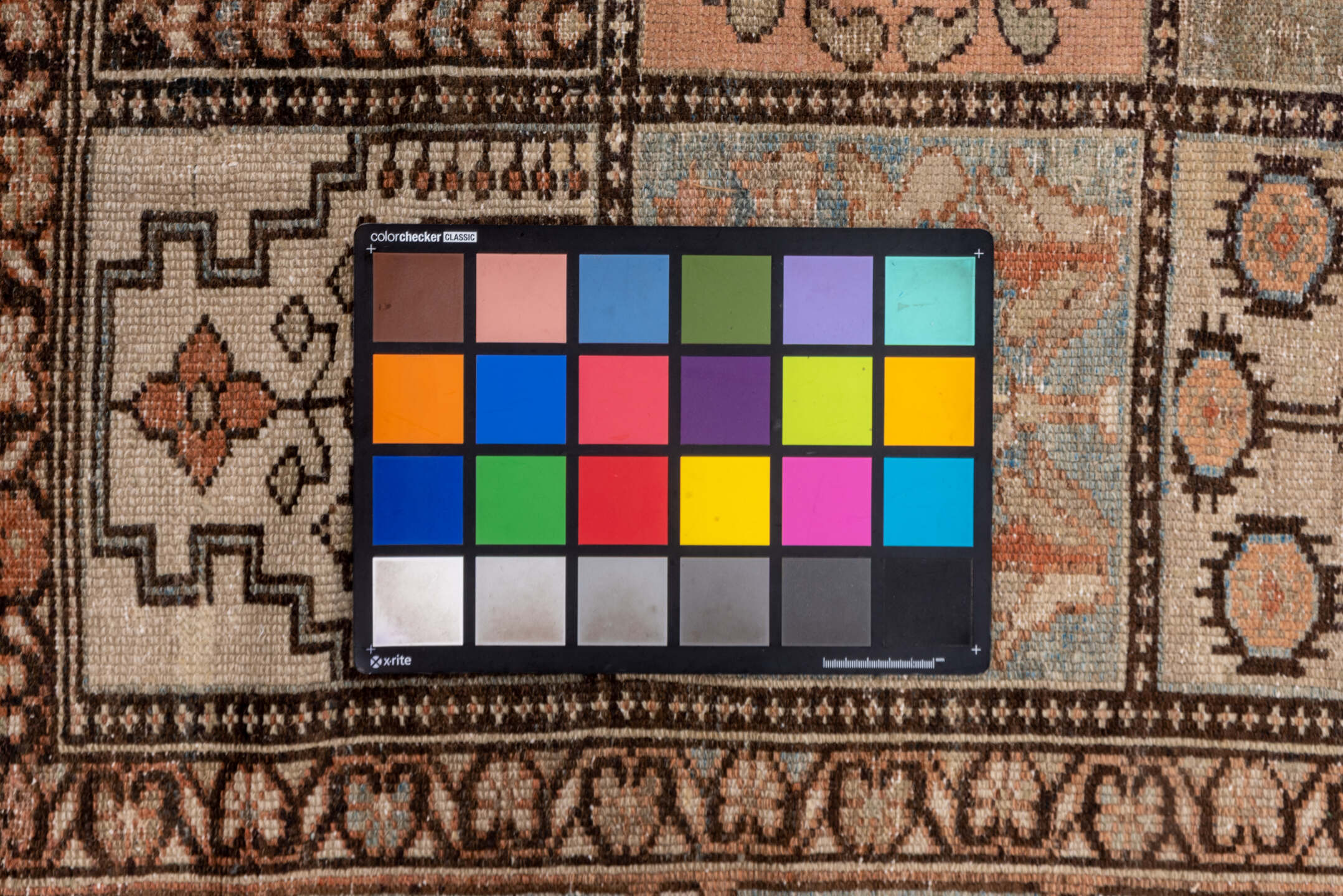 4' x 6' one-of-a-kind handmade vintage Baktiary small size rug. Color palette: brown, gray, orange, pink