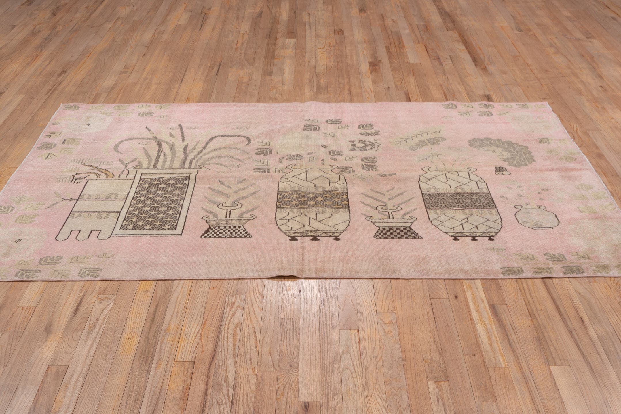 4' x 7' one-of-a-kind handmade antique Khotan rug. Color palette: rose, taupe, ivory, olive, beige, charcoal, pink, red