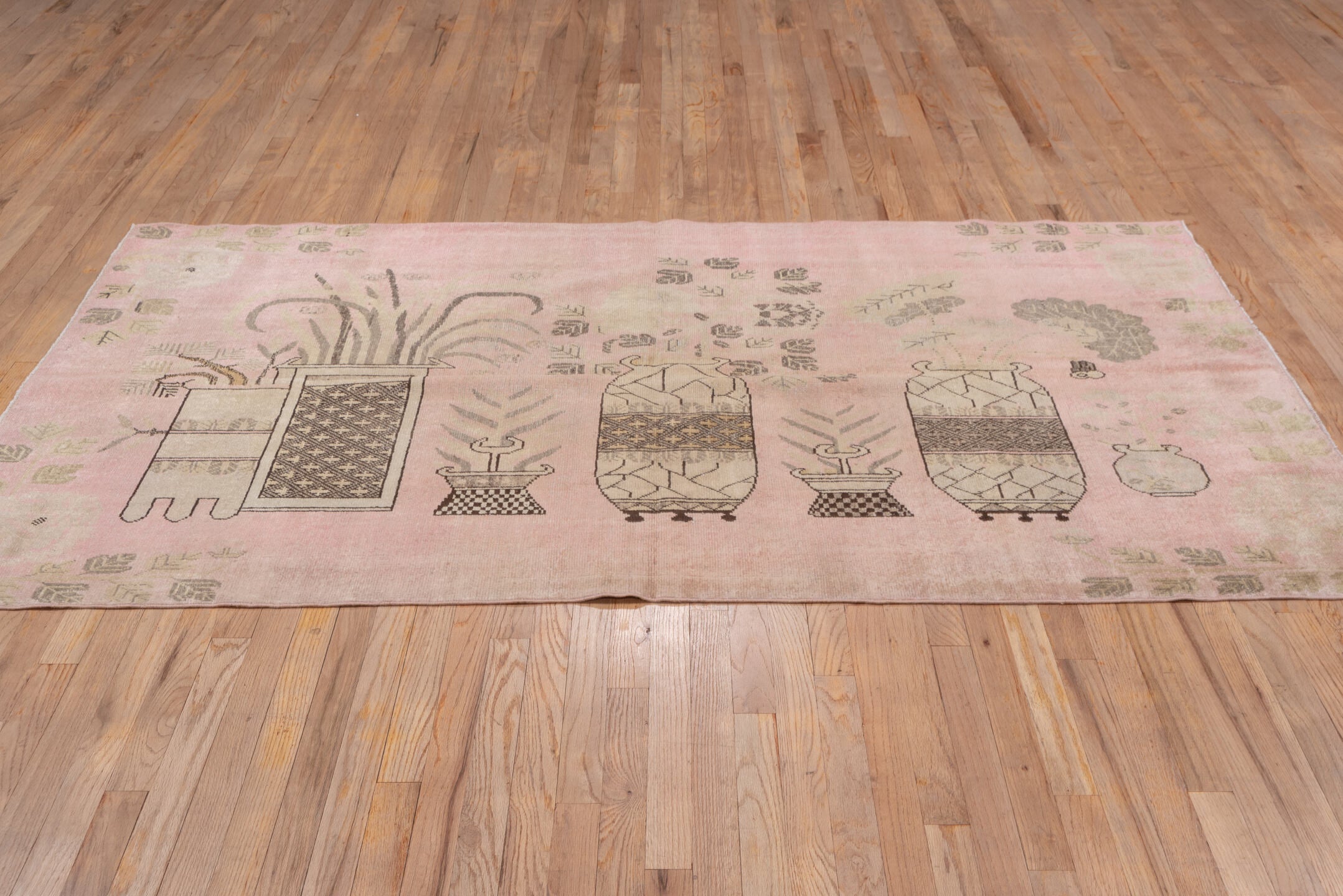 4' x 7' one-of-a-kind handmade vintage Khotan rug. Color palette: brown, gray, light gray, off-white, pink, snow, white