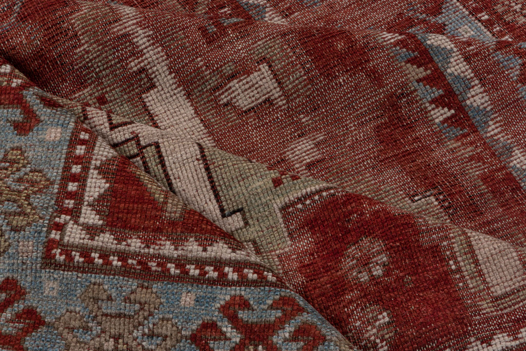 4' x 9' one-of-a-kind handmade antique Kazak runner rug. Color palette: rust, ivory, soft blue, brick, taupe, burgundy