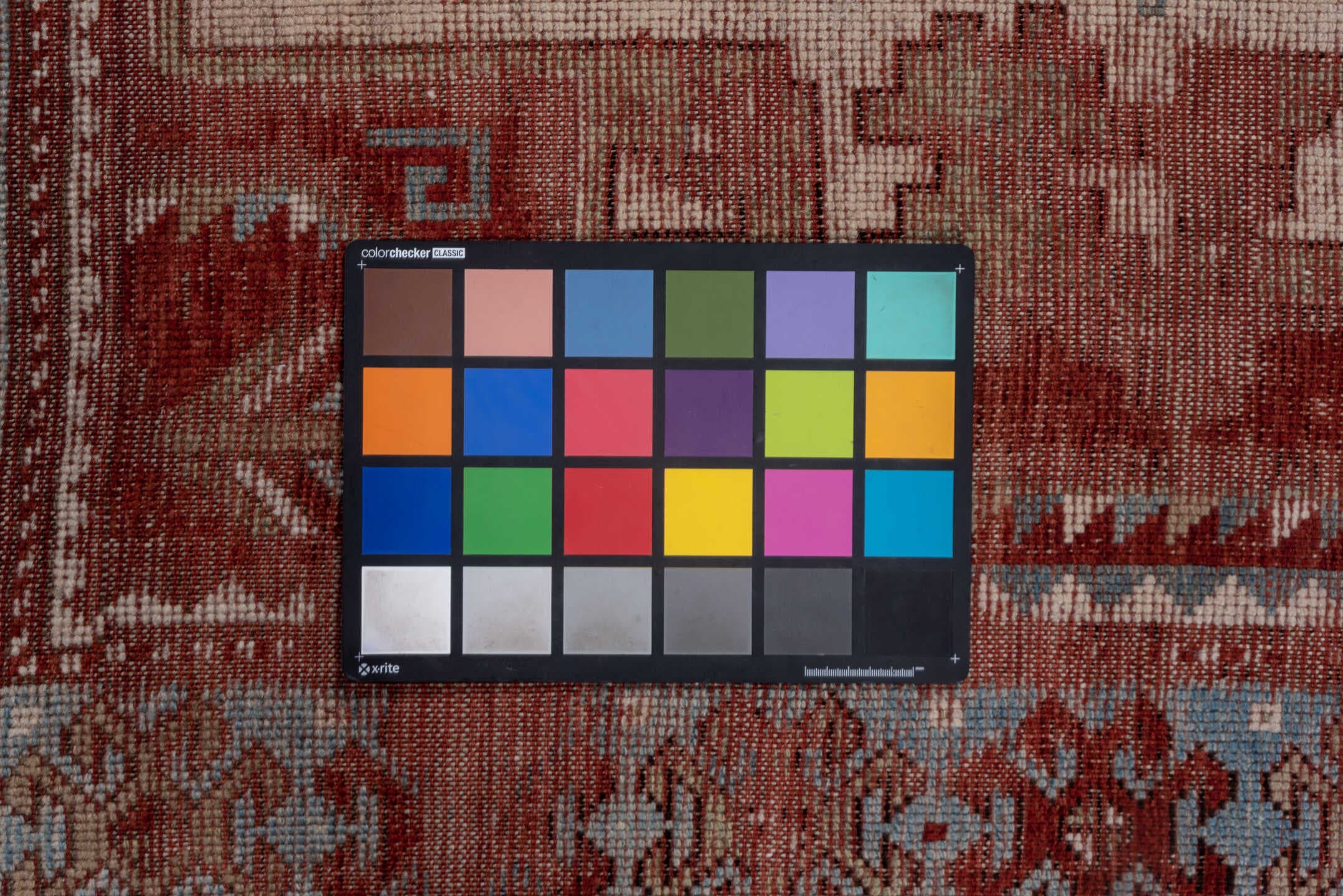 4' x 9' one-of-a-kind handmade antique Kazak runner rug. Color palette: rust, ivory, soft blue, brick, taupe, burgundy
