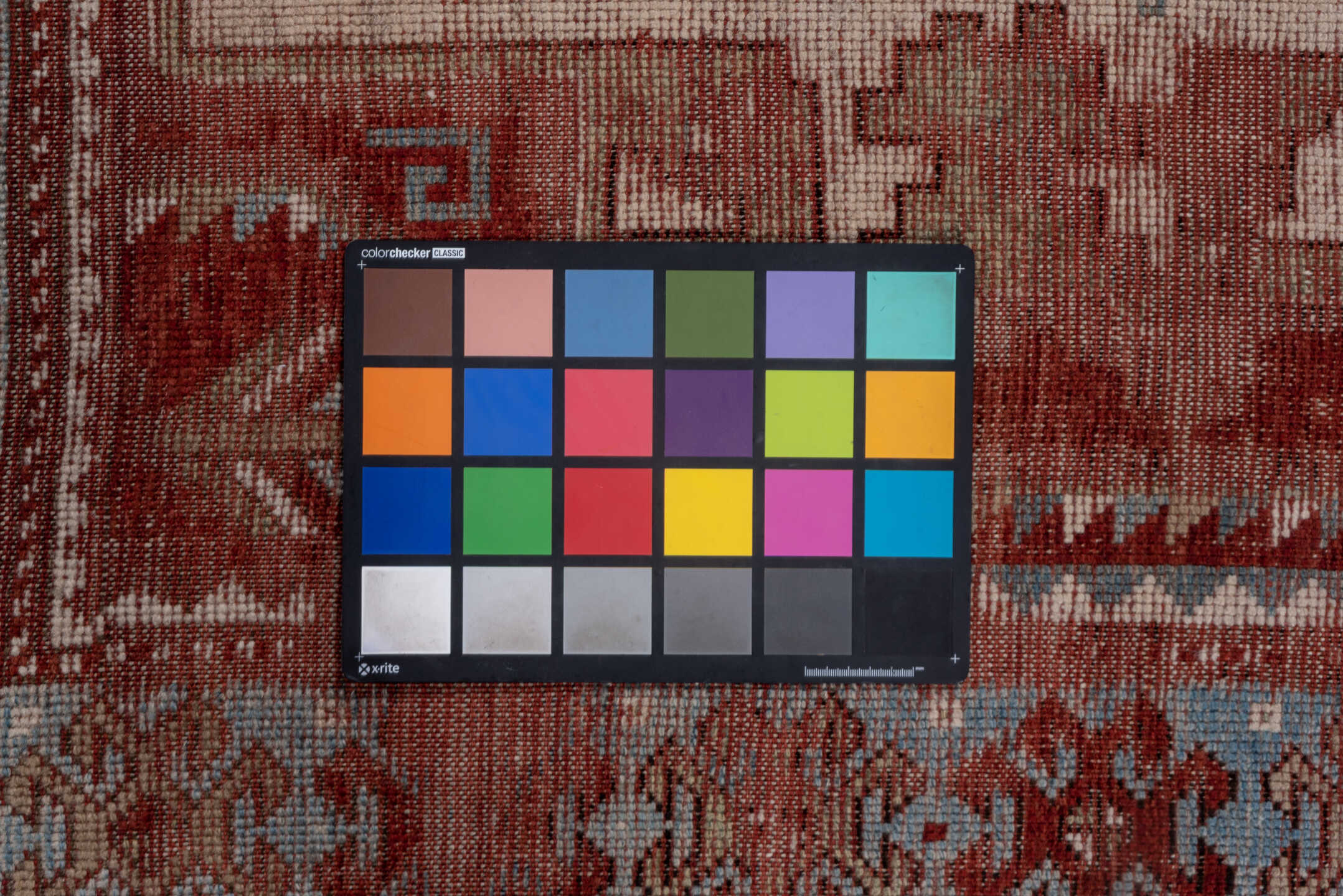 4' x 9' one-of-a-kind handmade antique Kazak runner rug. Color palette: rust, ivory, soft blue, brick, taupe, burgundy