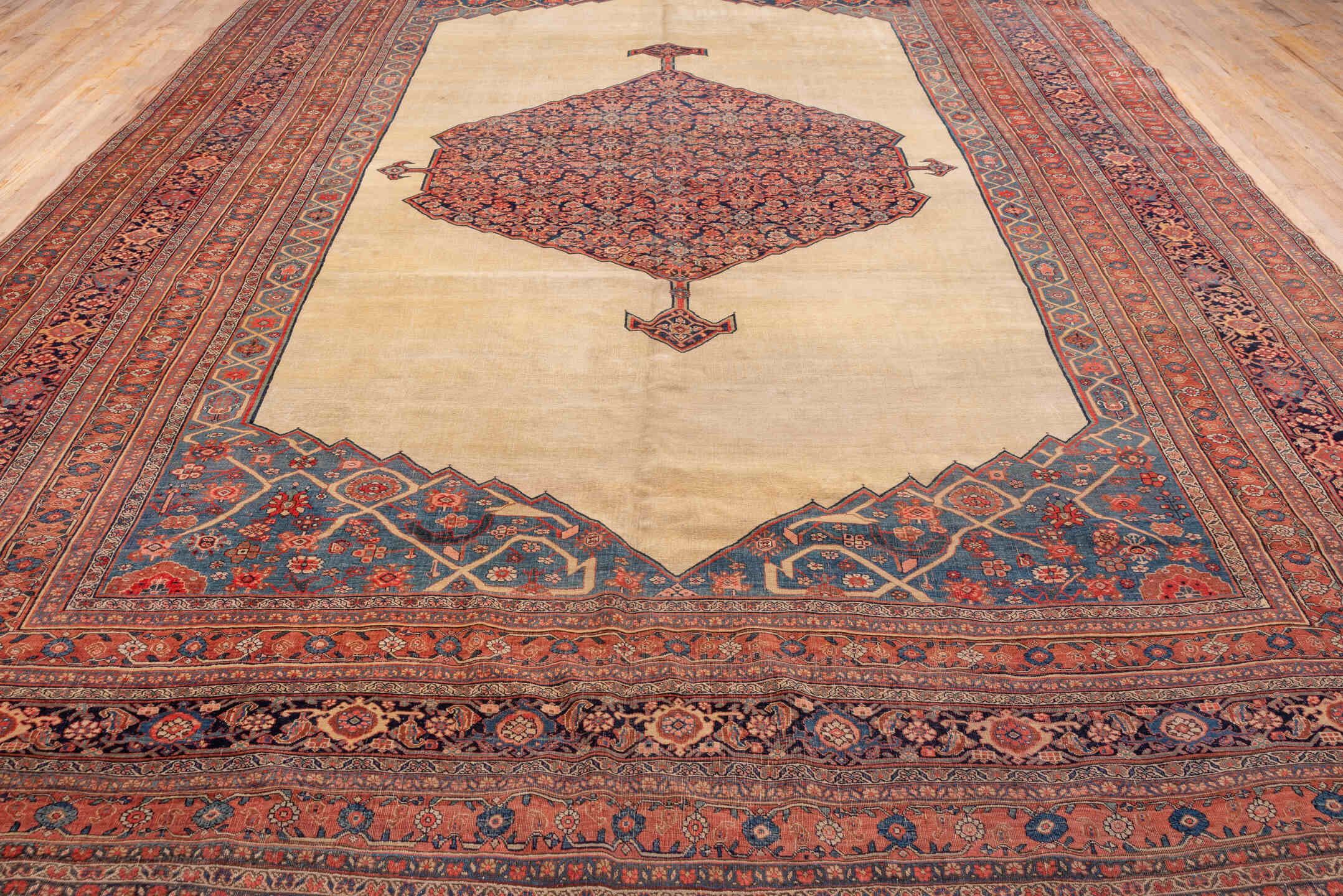 11' x 17' one-of-a-kind handmade antique Bidjar oversize rug. Color palette: ivory, rust, indigo, terracotta, navy, camel