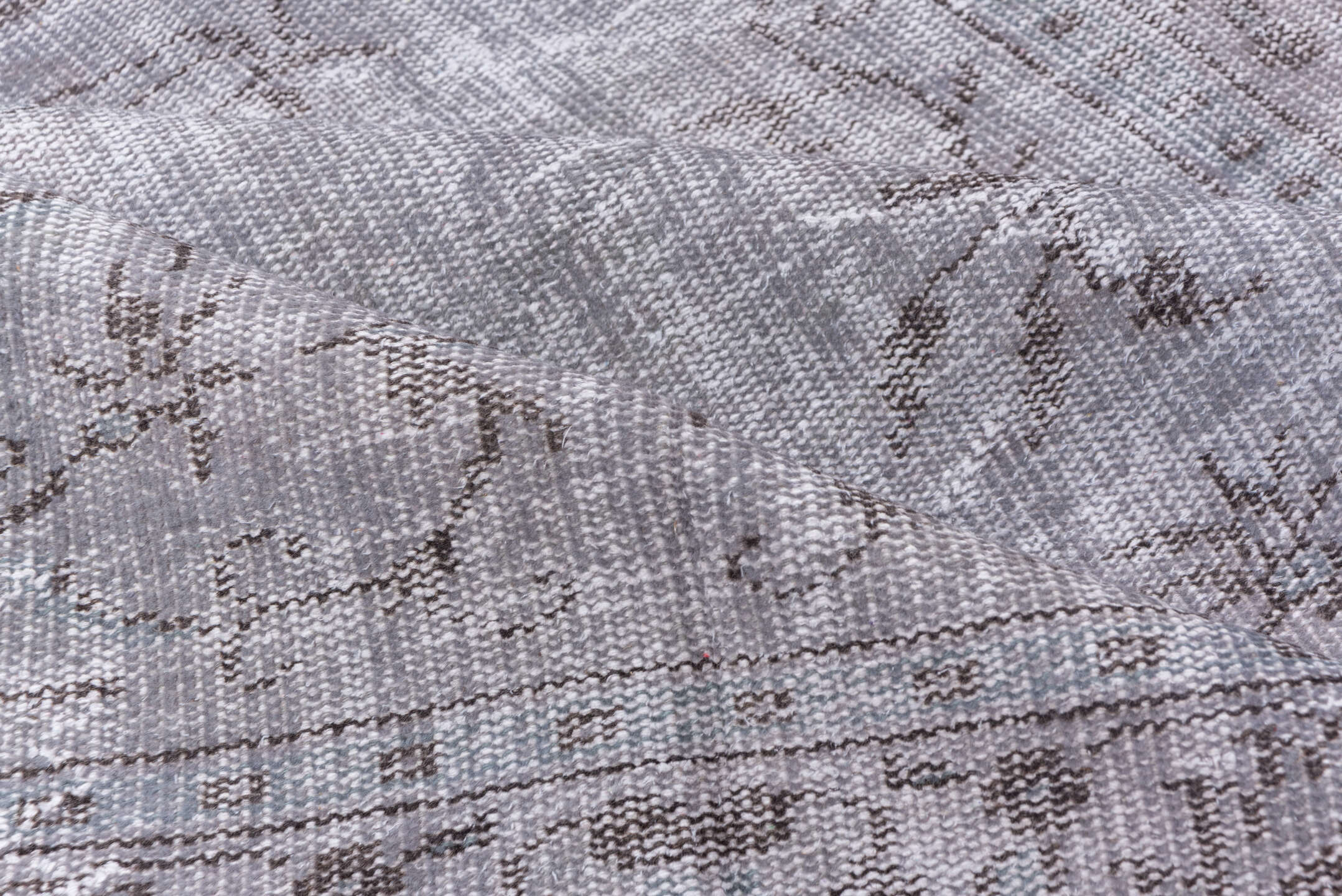 5' x 9' one-of-a-kind handmade vintage Overdyed medium size rug. Color palette: gray, taupe, charcoal, ivory, beige, black