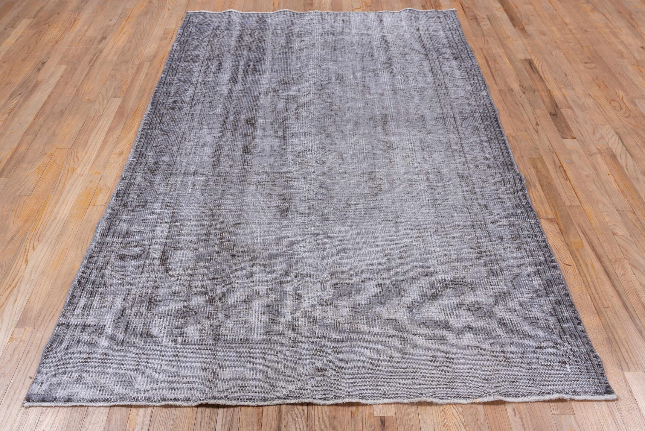 5' x 8' one-of-a-kind handmade vintage Overdyed medium size rug. Color palette: silver, gray, taupe, charcoal, ivory, beige