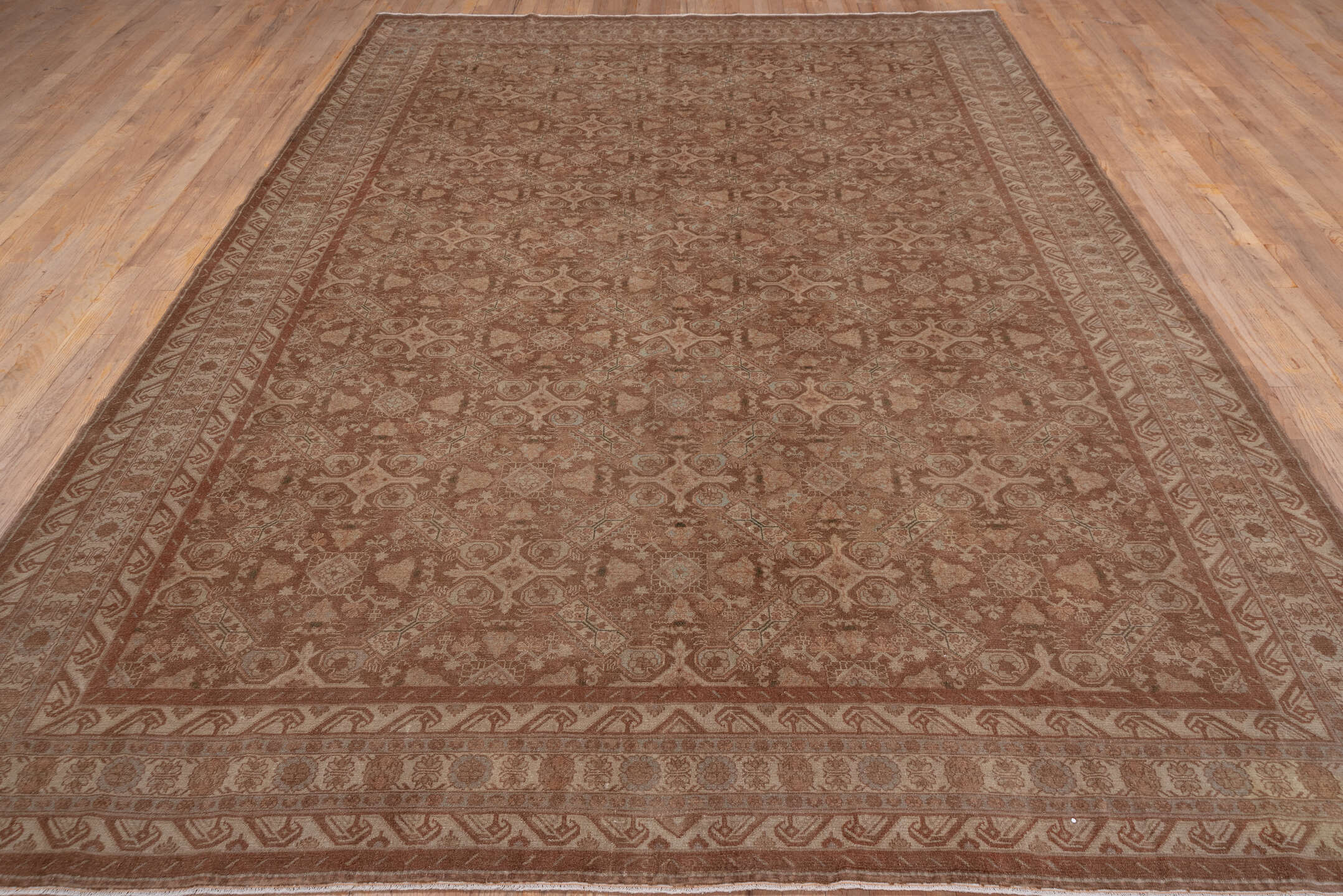 8' x 11' one-of-a-kind handmade antique Sivas large size rug. Color palette: terra cotta, camel, ivory, taupe, rose, sienna