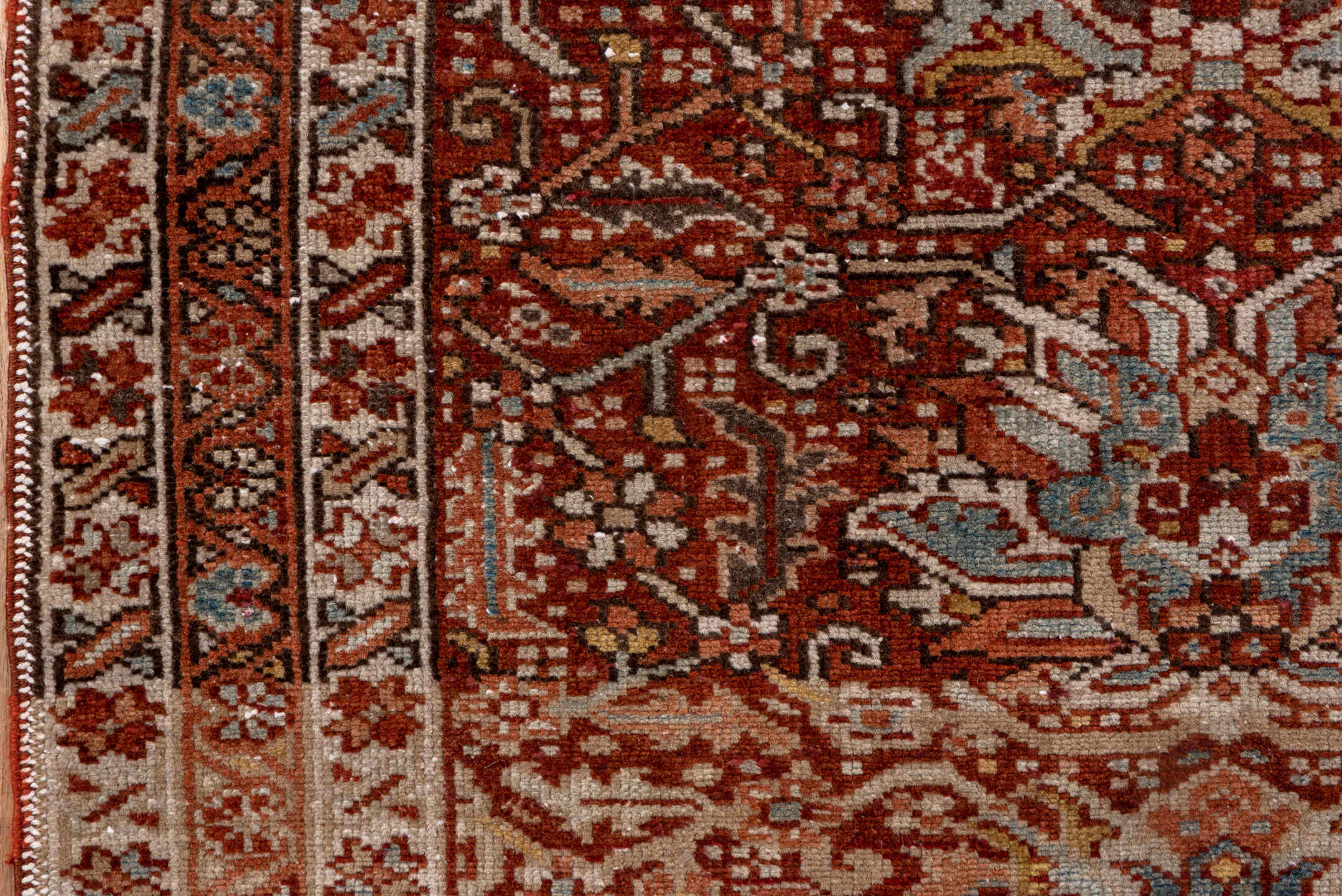 3' x 11' one-of-a-kind handmade antique Karaje runner rug. Color palette: rust, ivory, terra cotta, camel, brown, slate blue