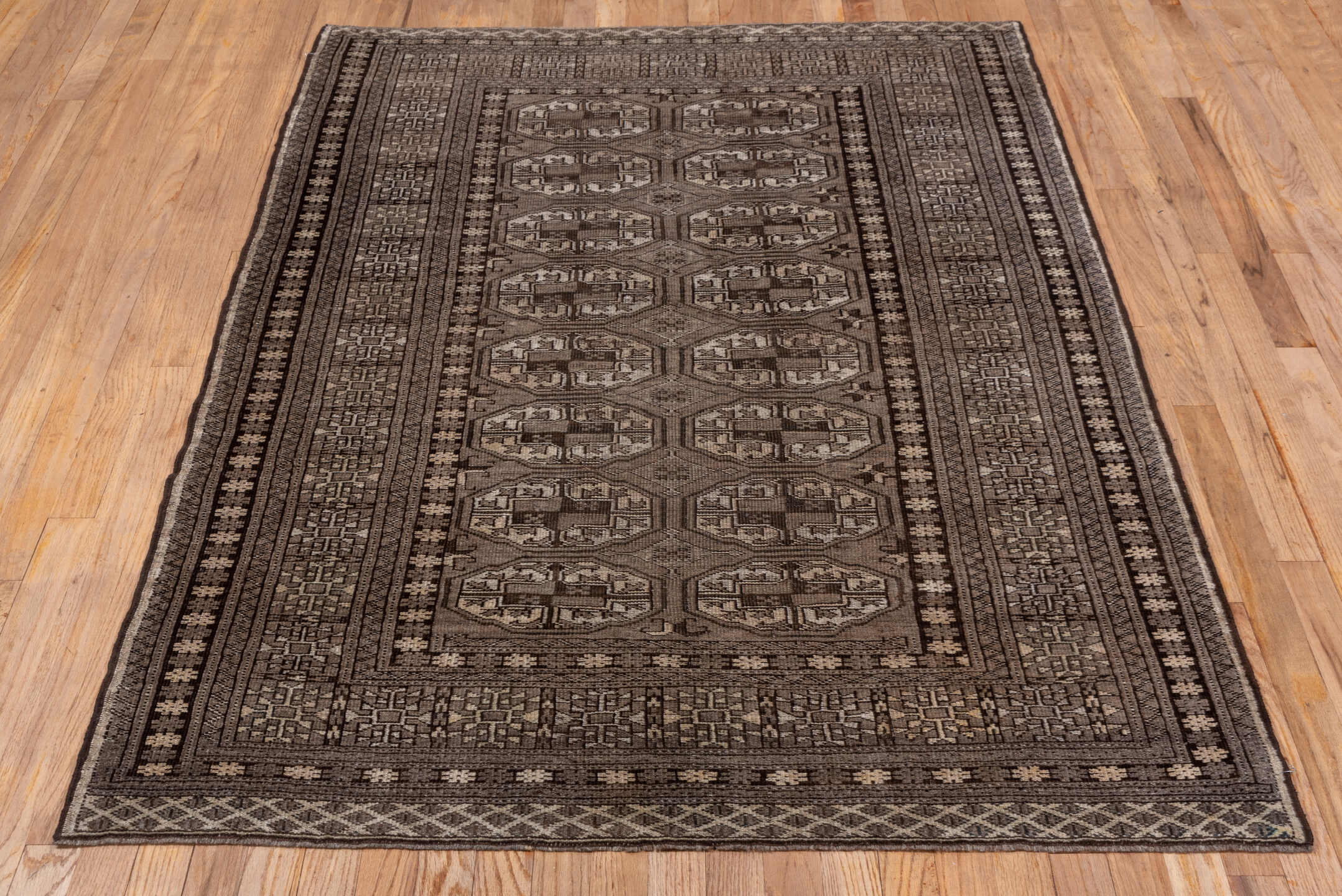 4' x 6' one-of-a-kind handmade antique Afghan small size rug. Color palette: brown, taupe, ivory, camel, charcoal, beige