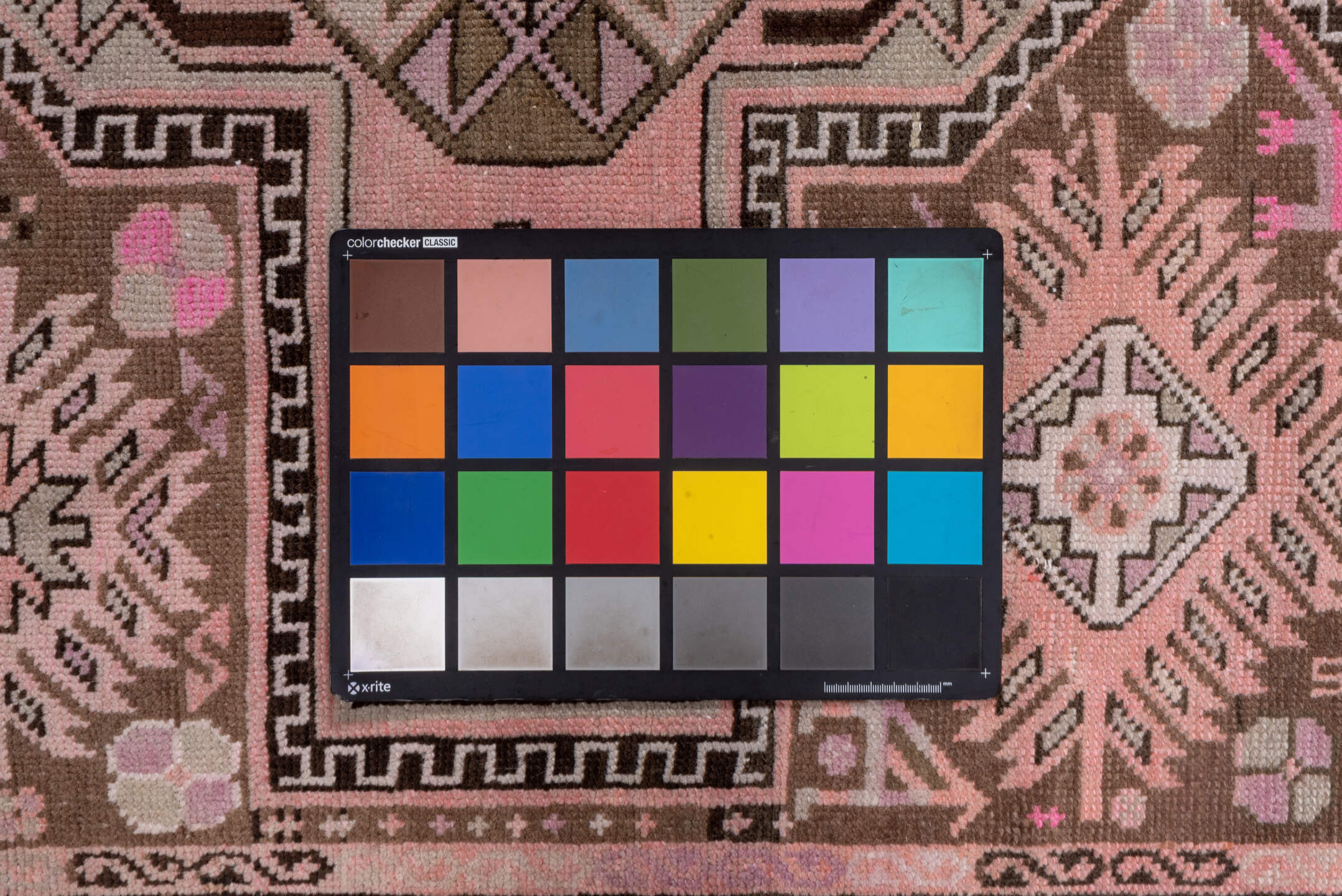 4' x 7' one-of-a-kind handmade vintage Karabagh rug. Color palette: brown, gray, pink, red, redwood