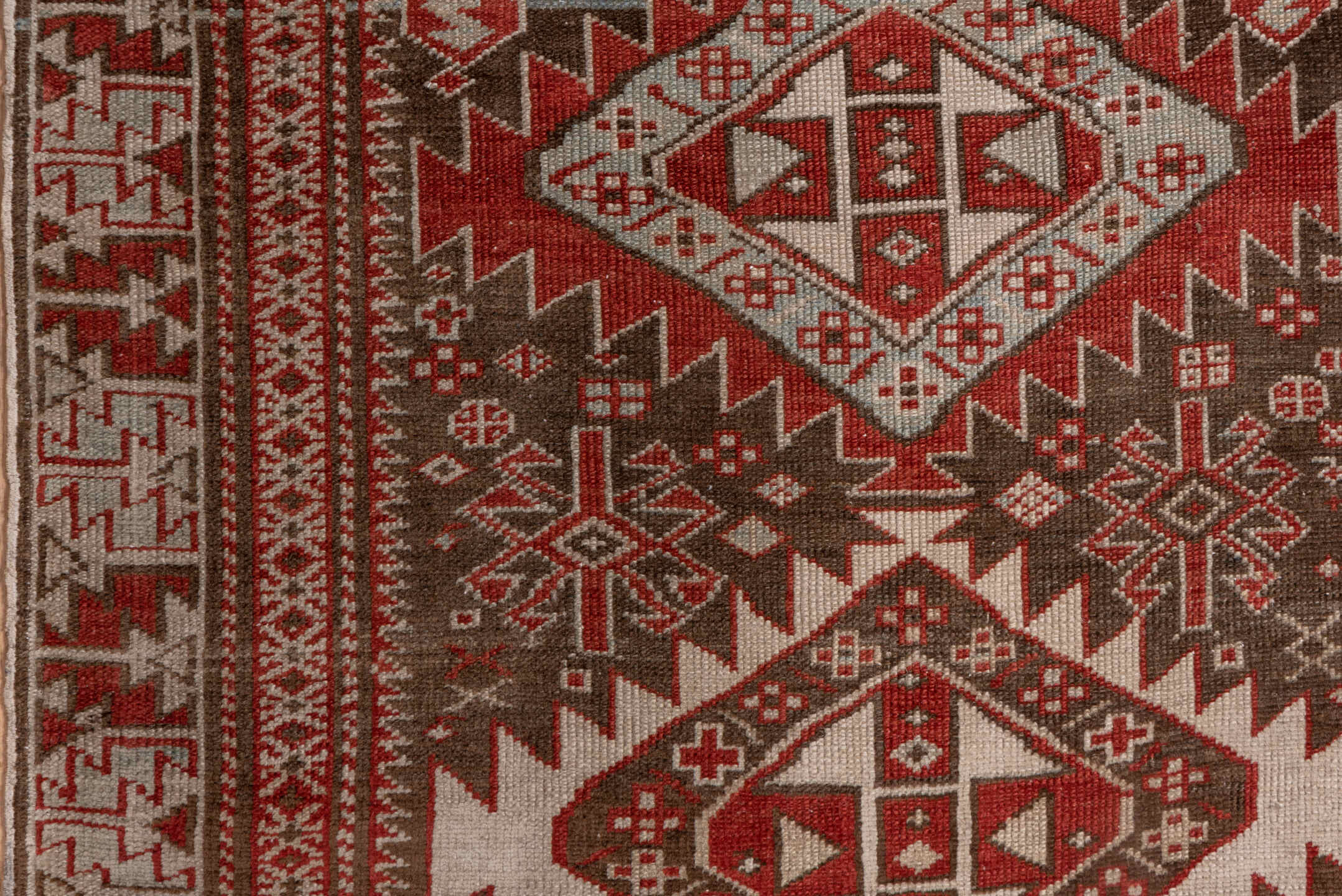 2' x 6' one-of-a-kind handmade antique Shirvan runner rug. Color palette: brown, rust, ivory, pale blue, taupe, brick, camel