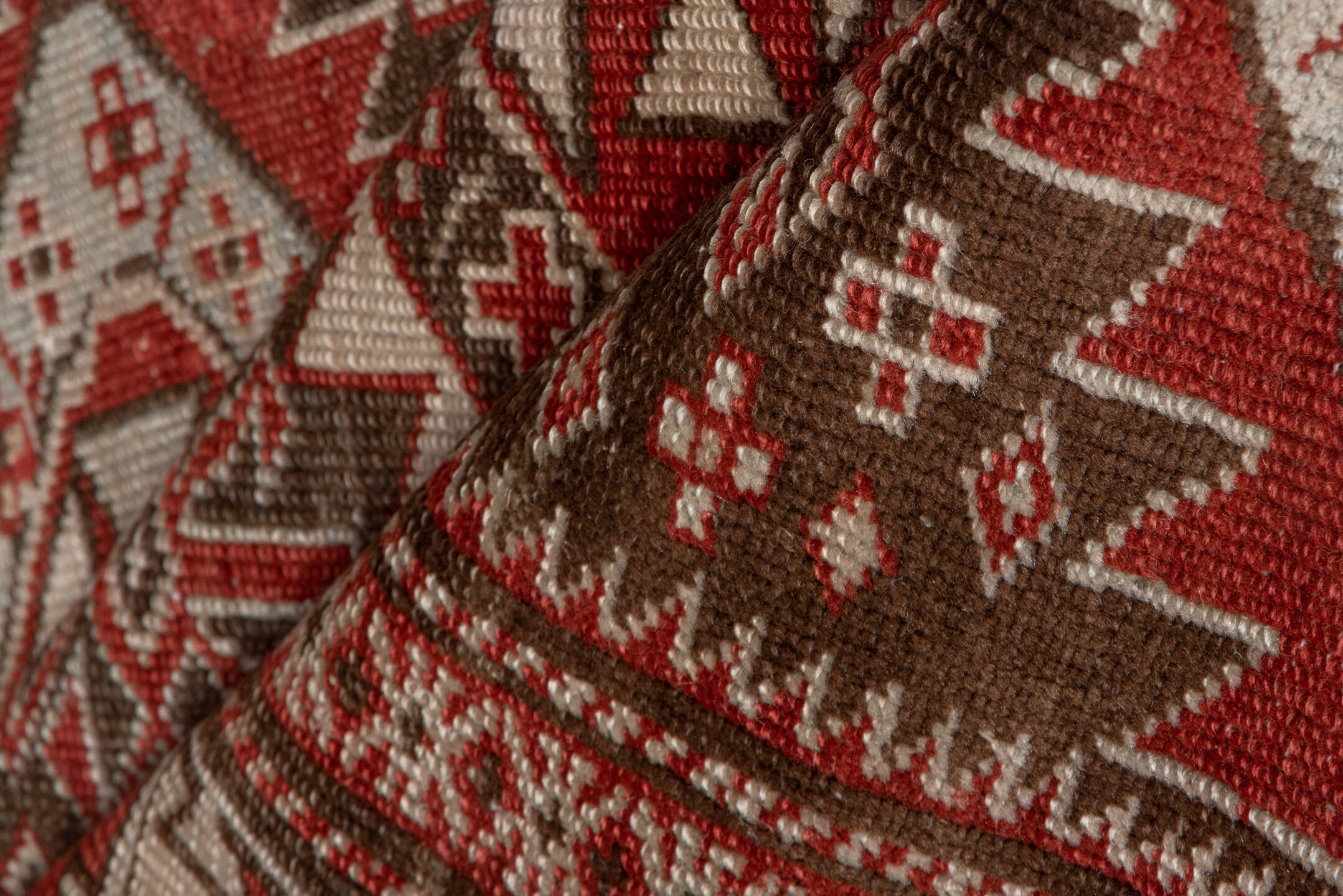 2' x 6' one-of-a-kind handmade vintage Shirvan runner rug. Color palette: brown, pink, red