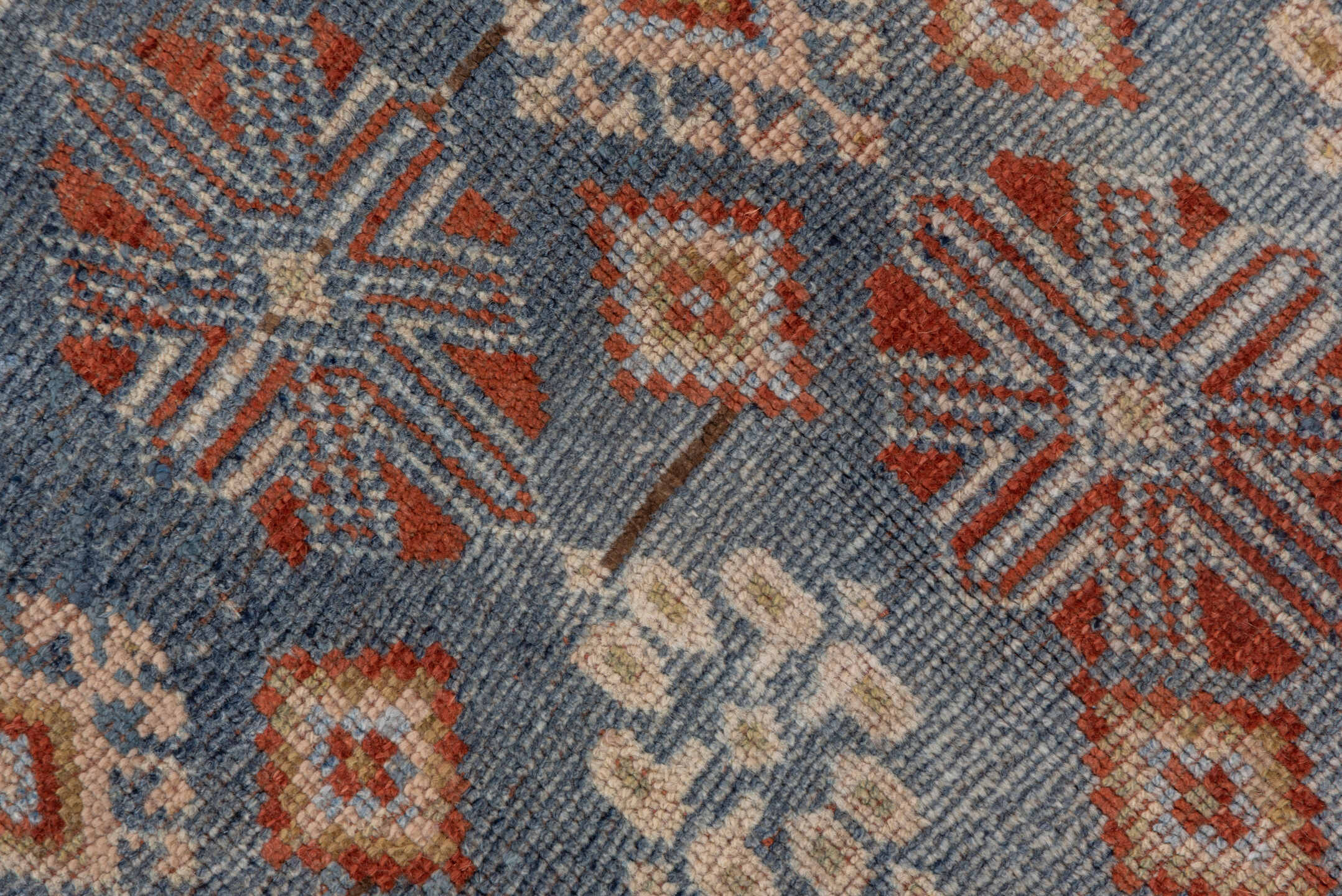4' x 9' one-of-a-kind handmade antique Caucasian runner rug. Color palette: blue, ivory, rust, taupe, slate, camel