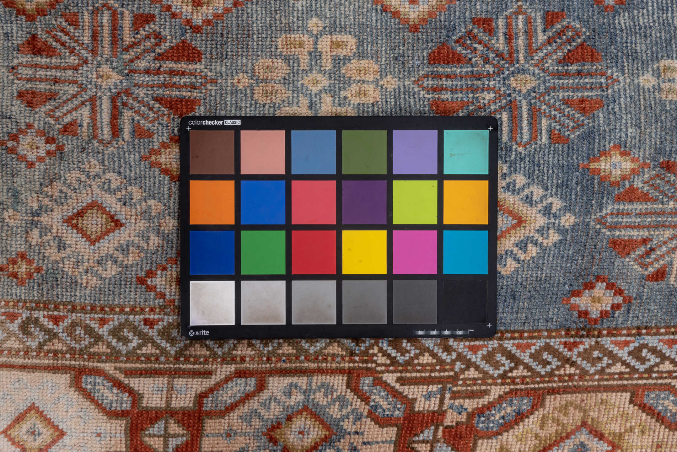 4' x 9' one-of-a-kind handmade vintage Caucasian runner rug. Color palette: brown, gray, pink