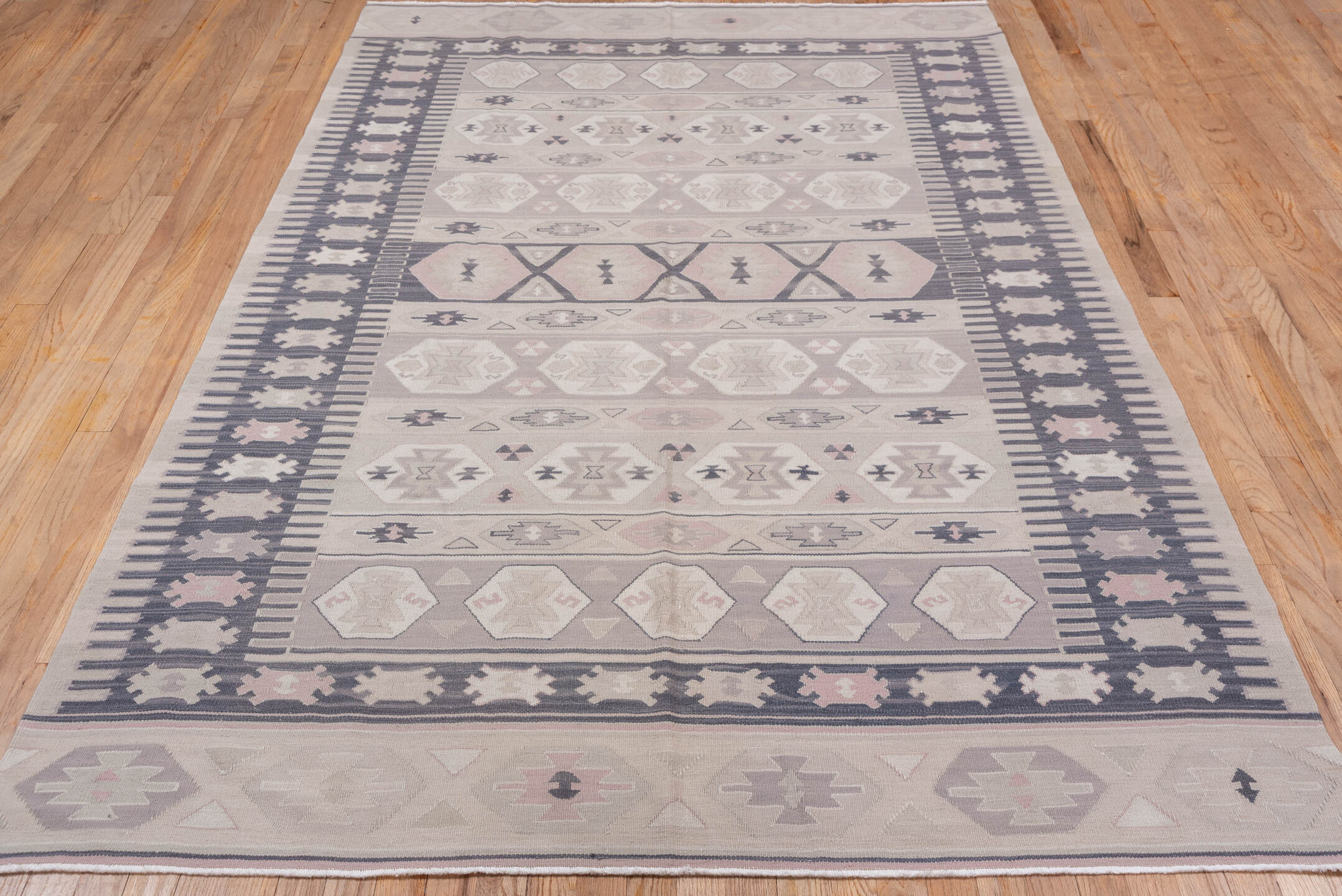 5' x 8' one-of-a-kind handmade antique Kilim medium size rug. Color palette: ivory, taupe, charcoal, blush, beige, soft pink