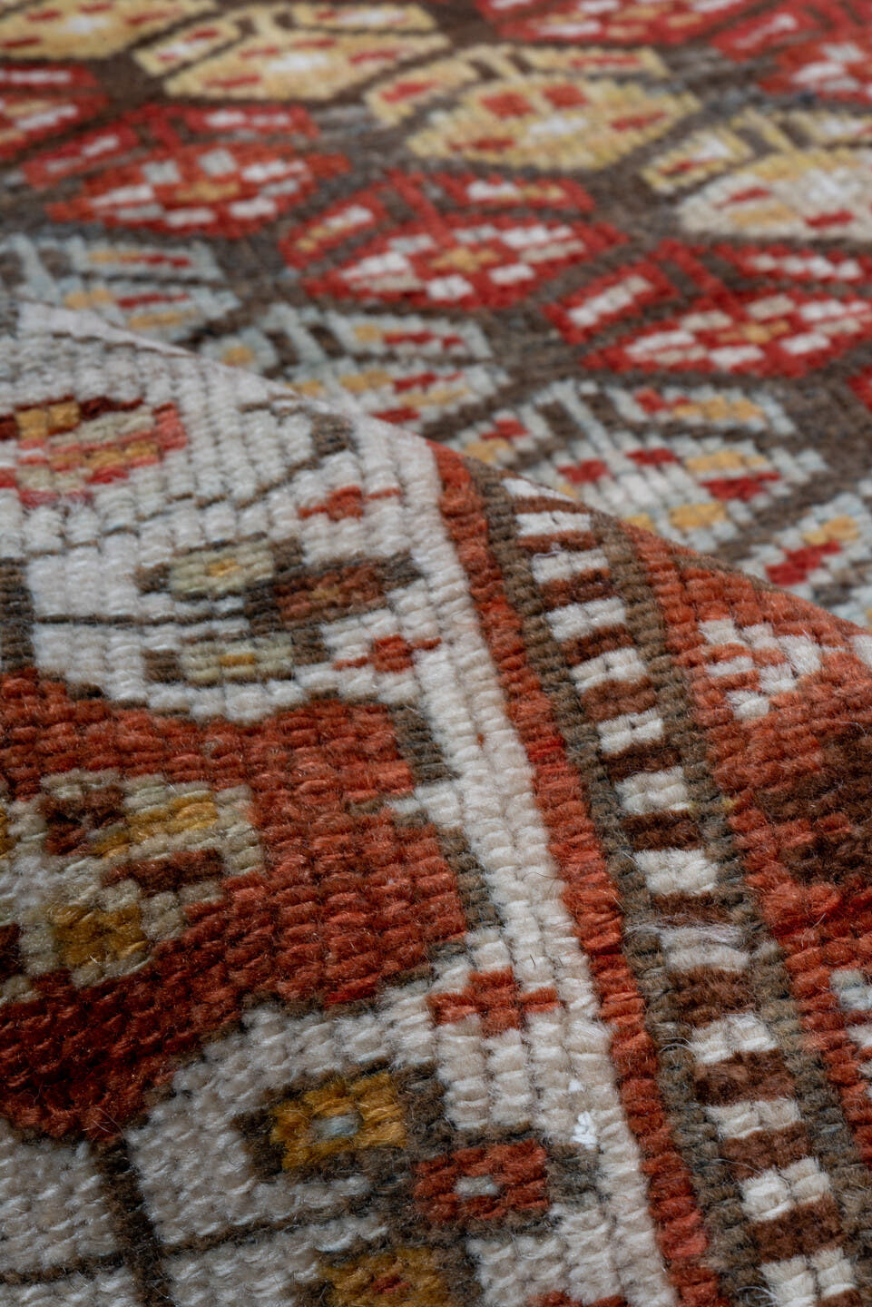 3' x 7' one-of-a-kind handmade antique Kurd rug. Color palette: rust, ivory, sky blue, camel, olive, brown, brick, slate