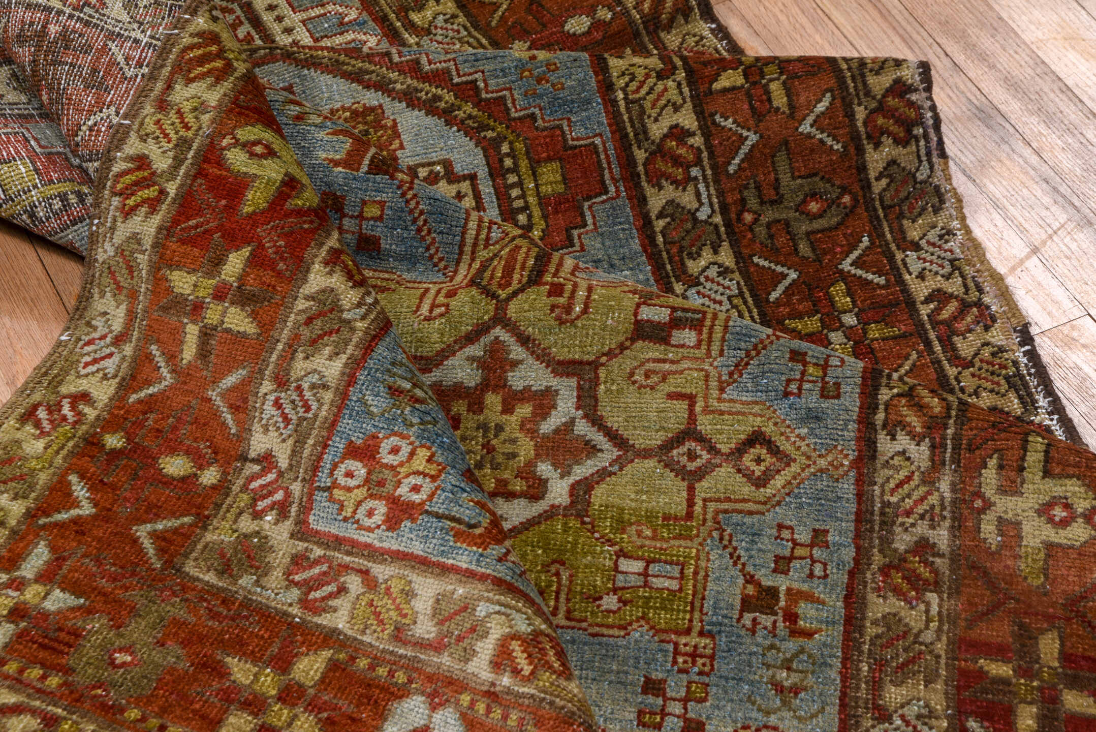 3' x 18' one-of-a-kind handmade antique Heriz runner rug. Color palette: rust, sky blue, ivory, brick, taupe, brown, slate