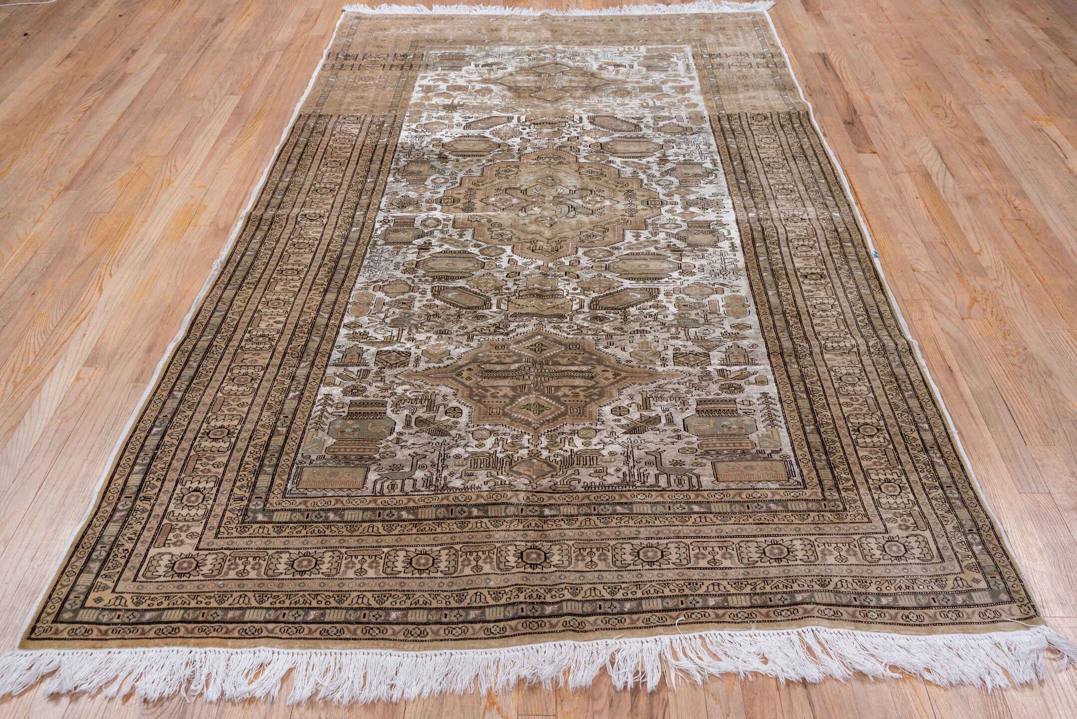 5' x 8' one-of-a-kind handmade antique Kaisary medium size rug. Color palette: taupe, ivory, brown, camel, beige, charcoal