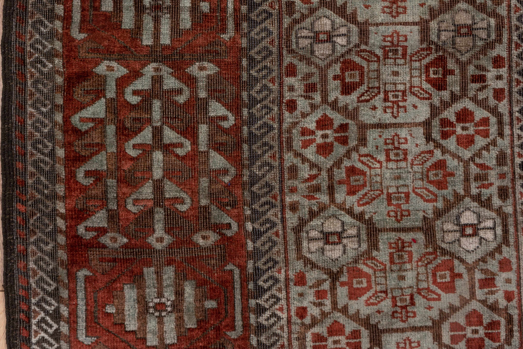 2' x 5' one-of-a-kind handmade antique Belouch small size rug. Color palette: rust, ivory, brown, camel, charcoal