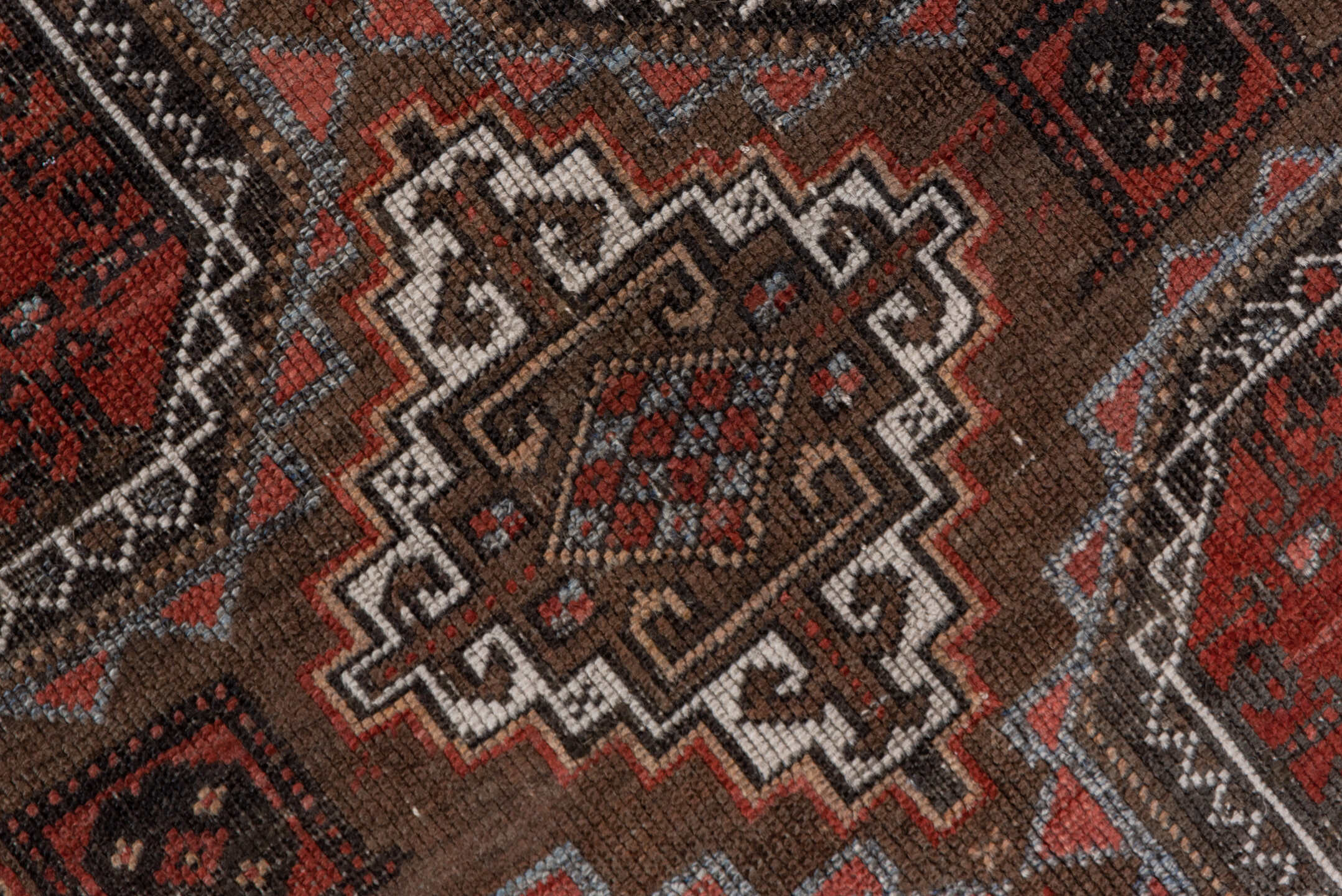 3' x 6' one-of-a-kind handmade vintage Belouch small size rug. Color palette: rust, brown, mahogany, ivory, charcoal, taupe