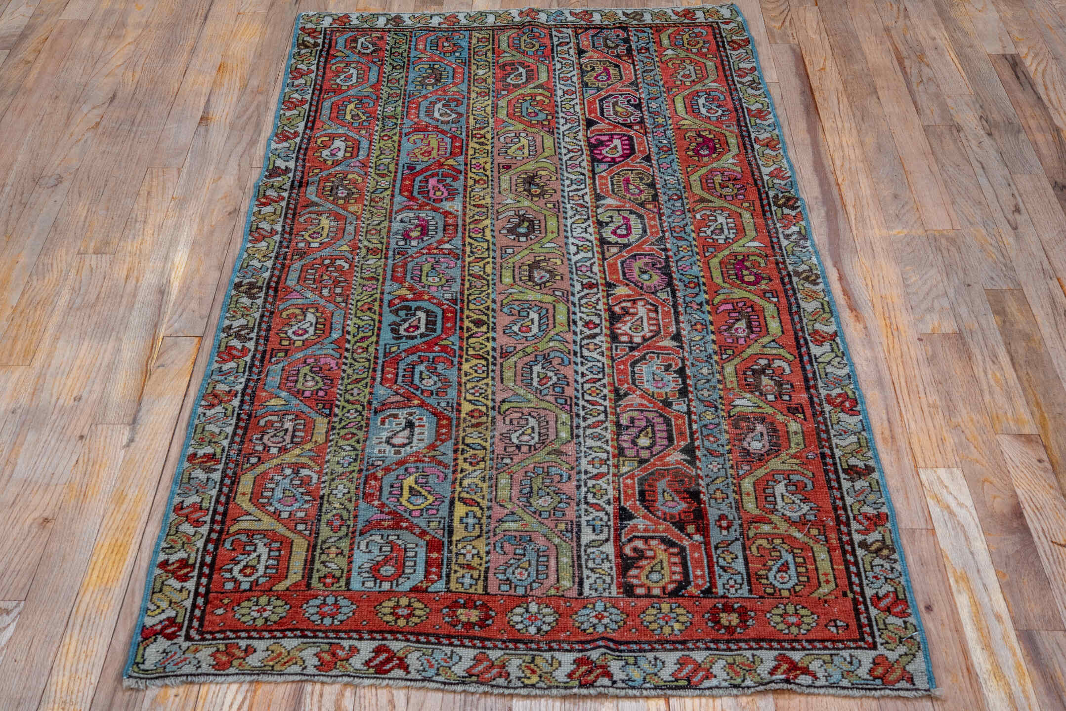 3' x 6' one-of-a-kind handmade antique Caucasian small size rug. Color palette: rust, ivory, camel, sky_blue, rose, slate