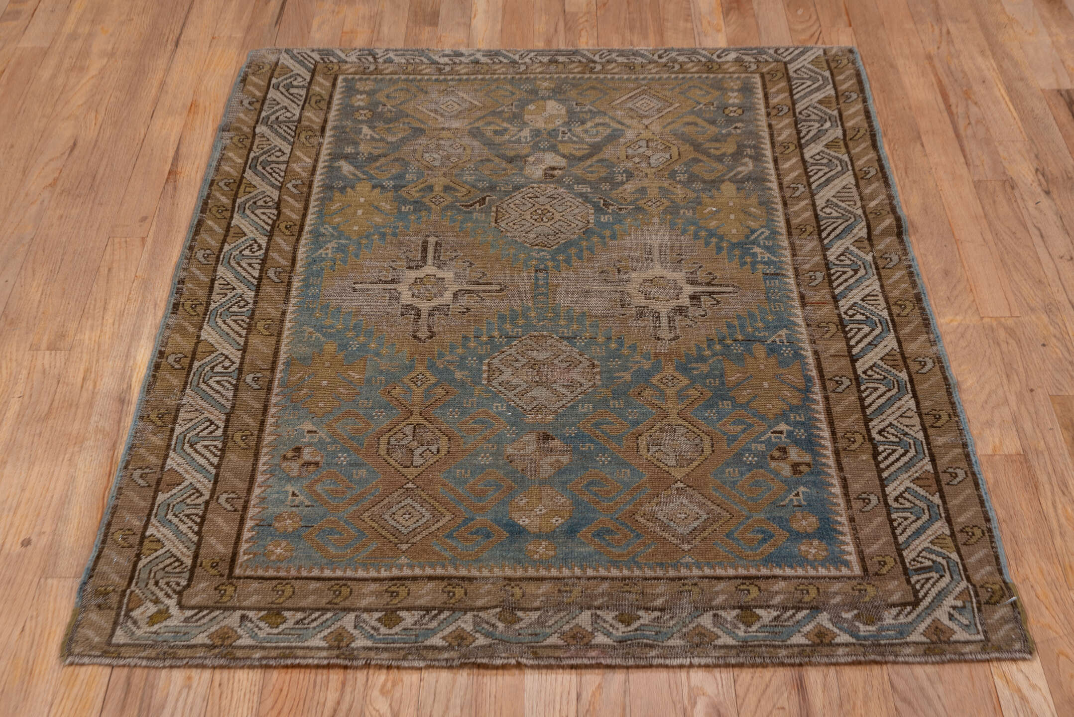 3' x 4' one-of-a-kind handmade antique Shirvan small size rug. Color palette: brown, blue, taupe, ivory, camel, slate, beige
