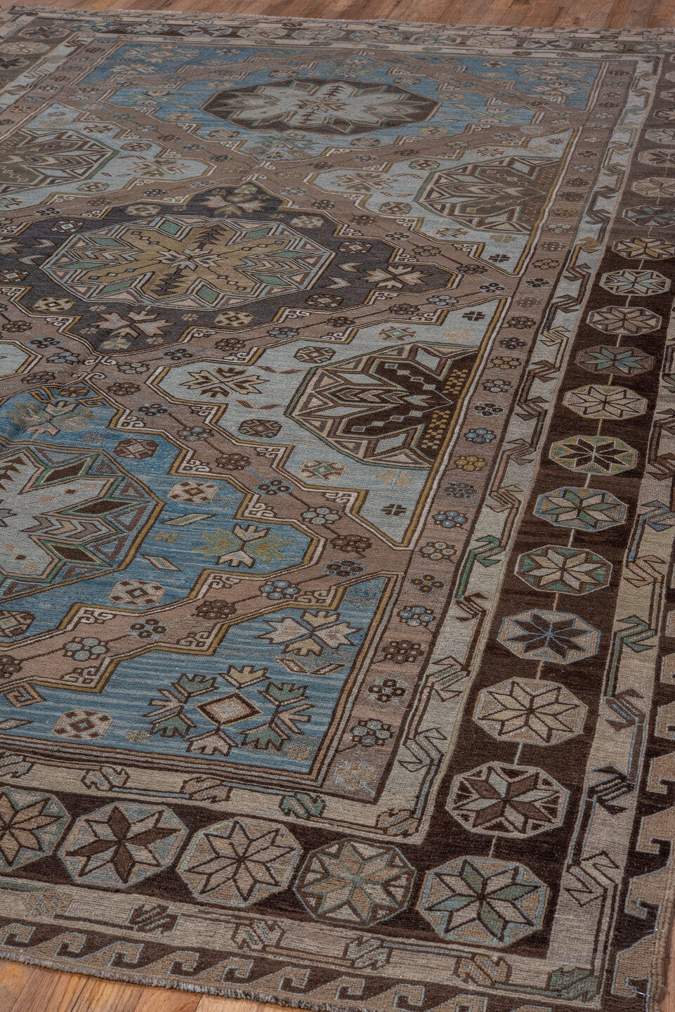 7' x 11' one-of-a-kind handmade antique Sumak large size rug. Color palette: taupe, brown, sky_blue, ivory, camel, charcoal