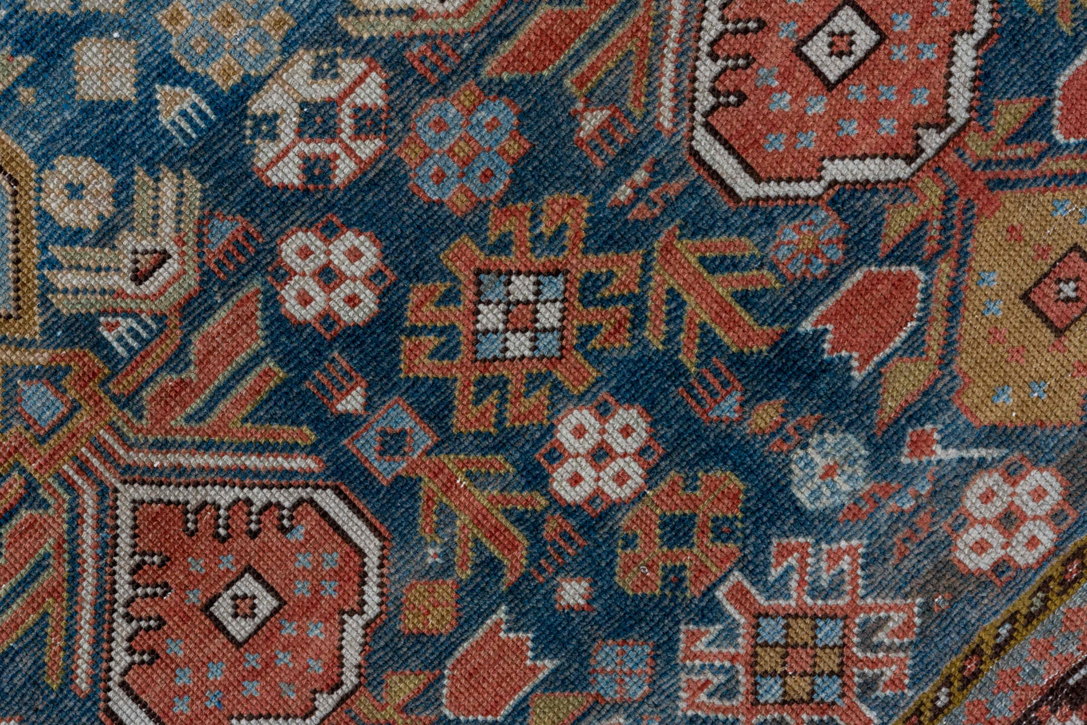 4' x 4' one-of-a-kind handmade antique Shirvan small size rug. Color palette: light blue, ivory, rust, brown, camel, navy