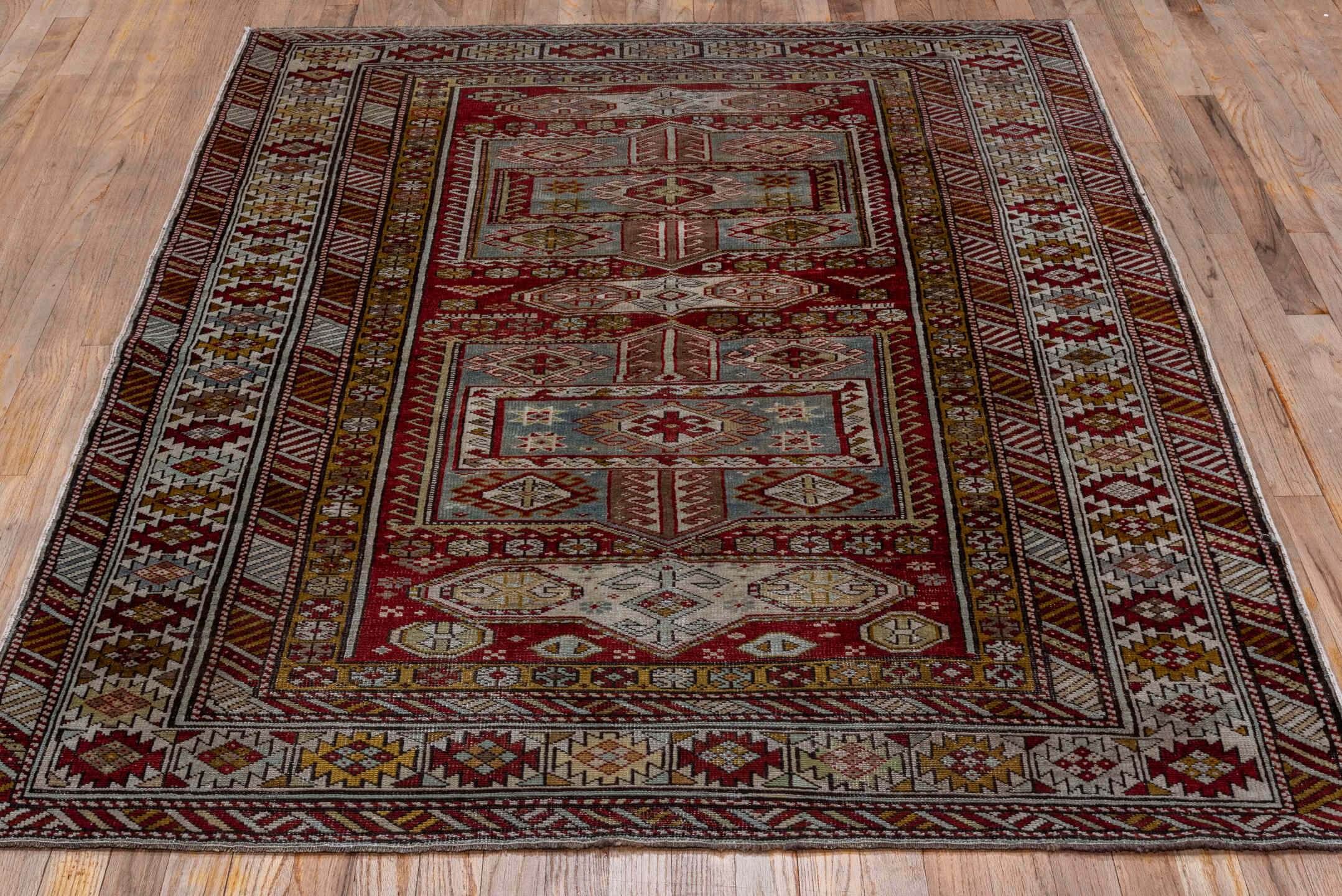 4' x 6' one-of-a-kind handmade vintage Shirvan small size rug. Color palette: brown, gray, pink, red