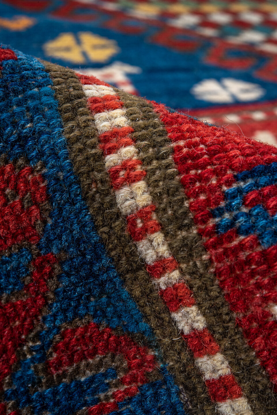 3' x 5' one-of-a-kind handmade vintage Caucasian small size rug. Color palette: blue, brown, dark red, gray