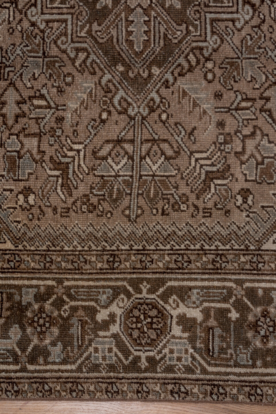 7' x 9' one-of-a-kind handmade vintage Heriz rug. Color palette: taupe, brown, ivory, charcoal, camel, greige, beige, gray