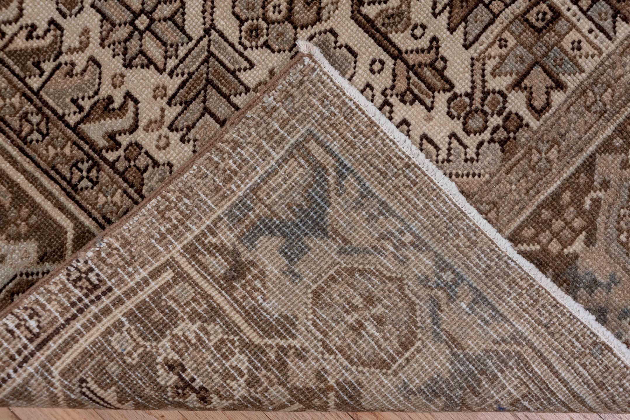 7' x 9' one-of-a-kind handmade vintage Heriz rug. Color palette: taupe, brown, ivory, charcoal, camel, greige, beige, gray
