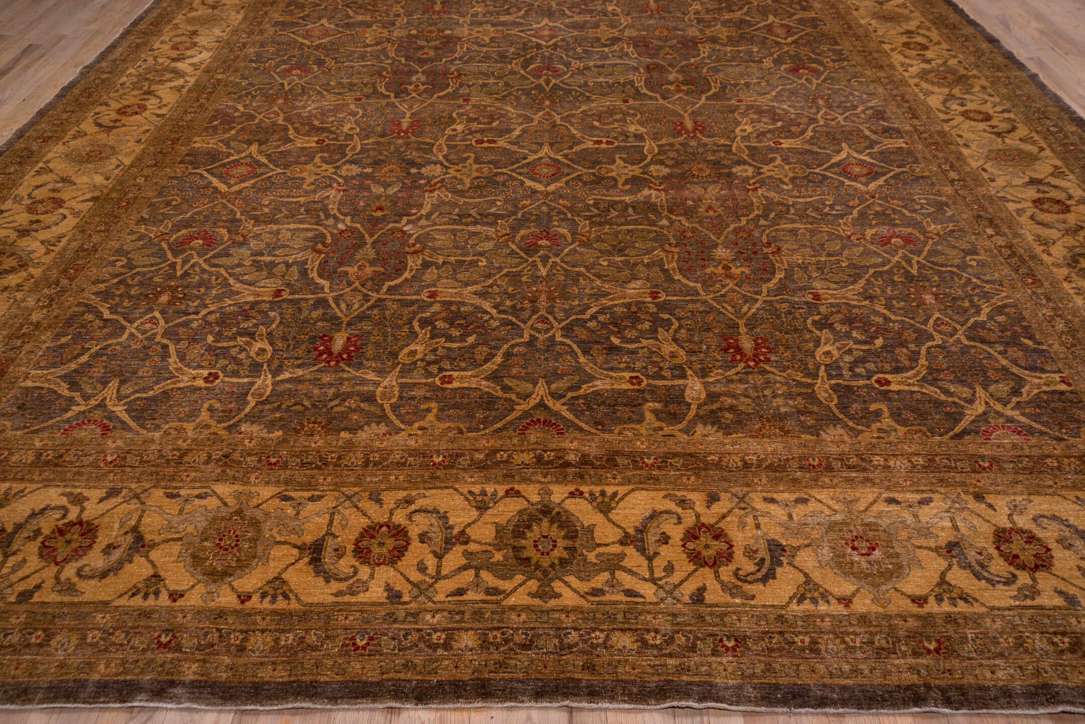 12' x 17' one-of-a-kind handmade vintage Amritzar oversize rug. Color palette: brown, camel, taupe, rust, gold, slate
