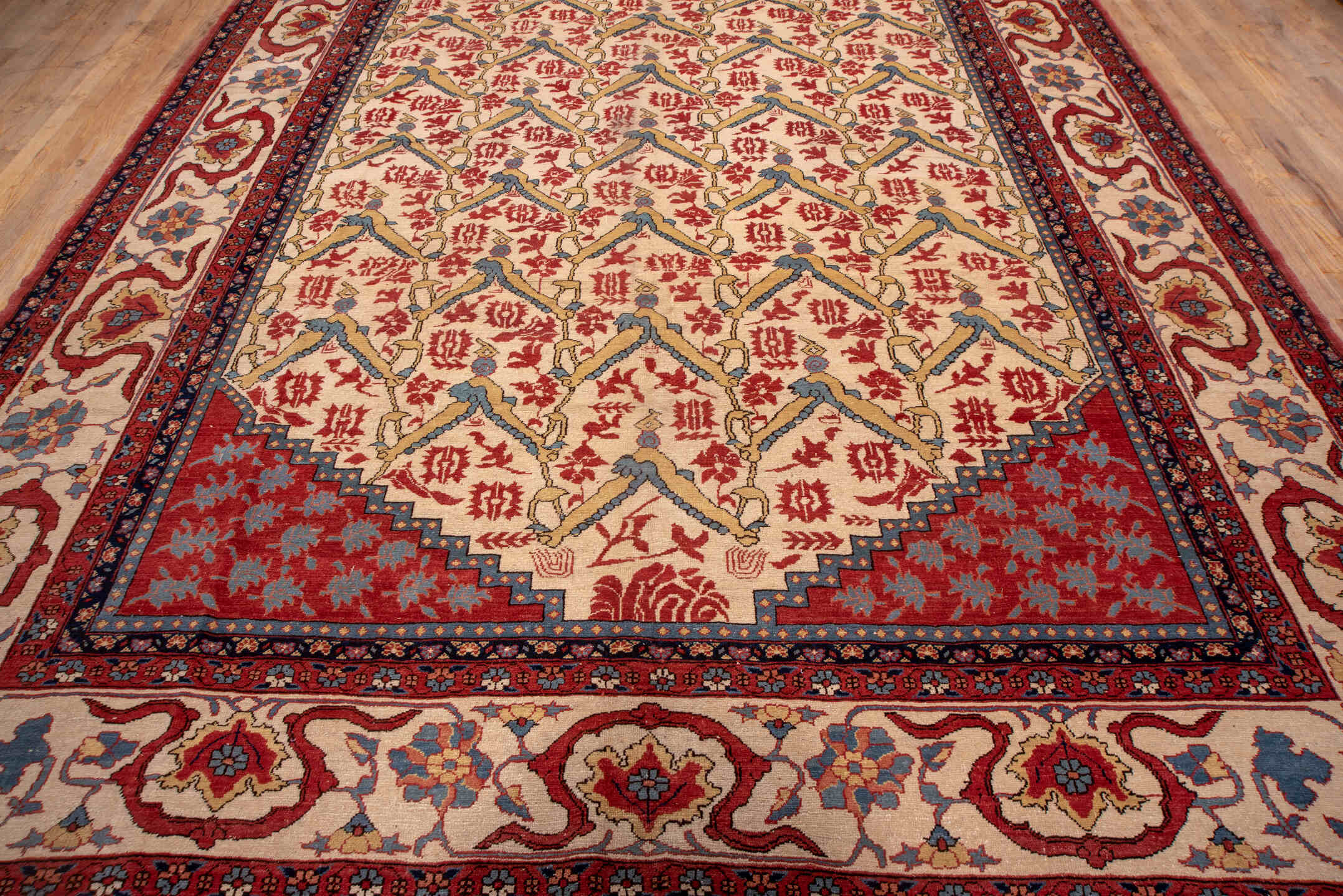 10' x 14' one-of-a-kind handmade vintage Serapi large size rug. Color palette: ivory, rust, indigo, soft blue, brick, camel