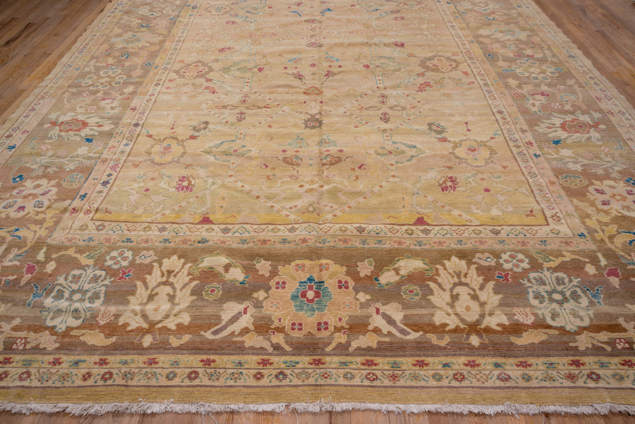 11' x 16' one-of-a-kind handmade vintage Sultanabad oversize rug. Color palette: camel, taupe, beige, ivory, sage